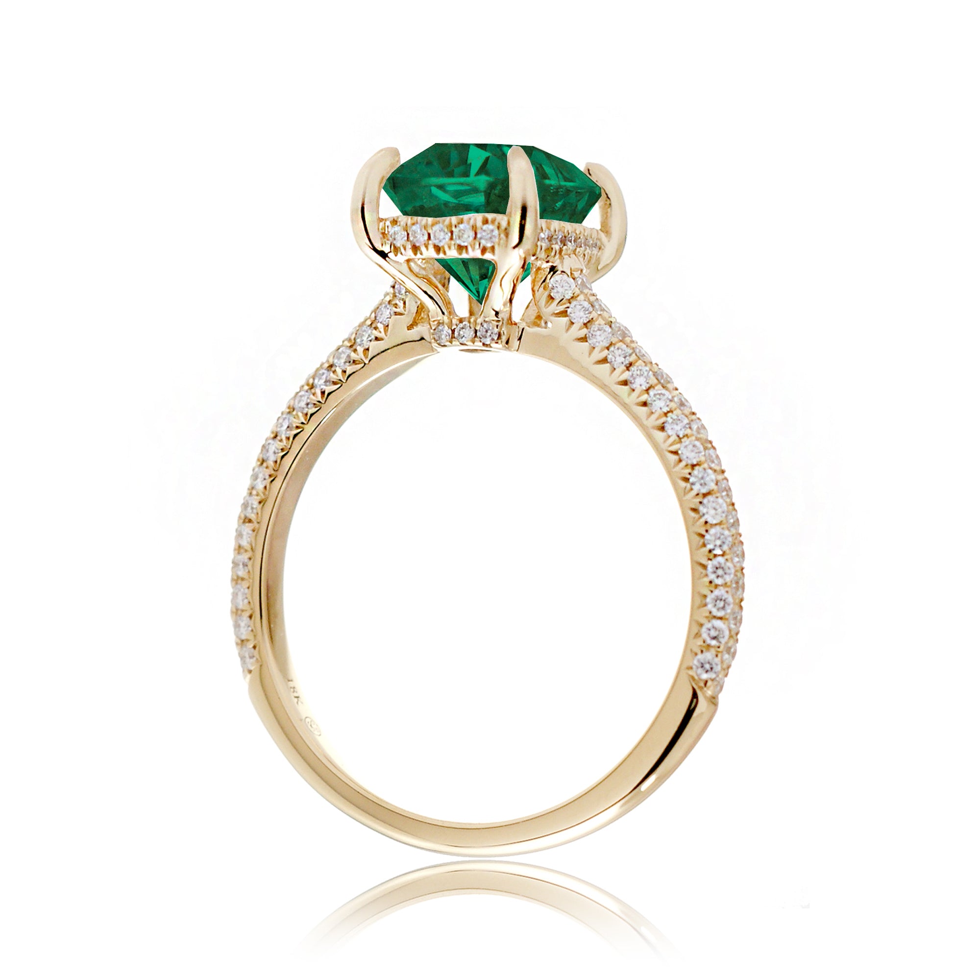 Elegant Green Emerald Ring with Three-Row Diamond Band