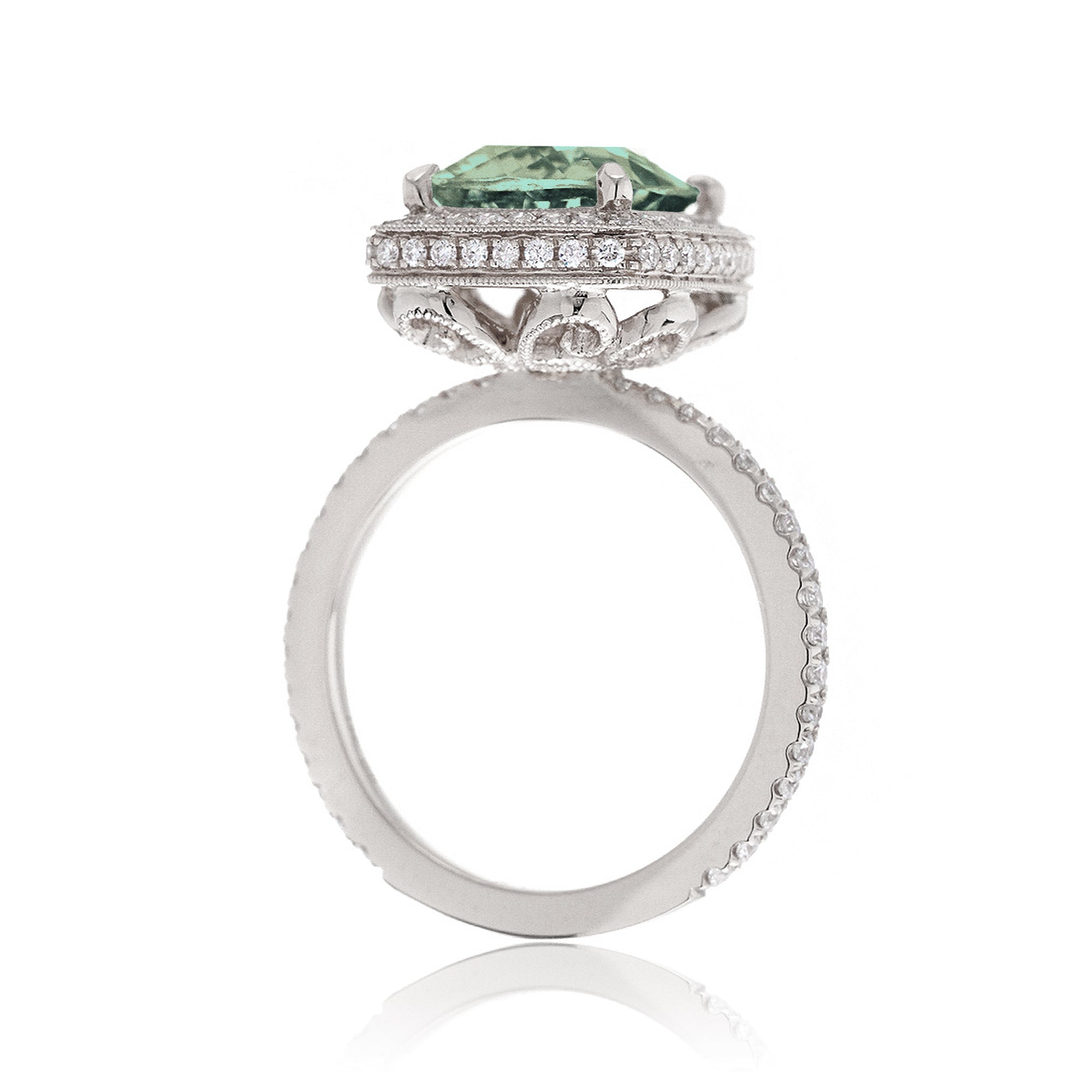 Cushion green sapphire engagement ring with vintage diamond halo and setting white gold