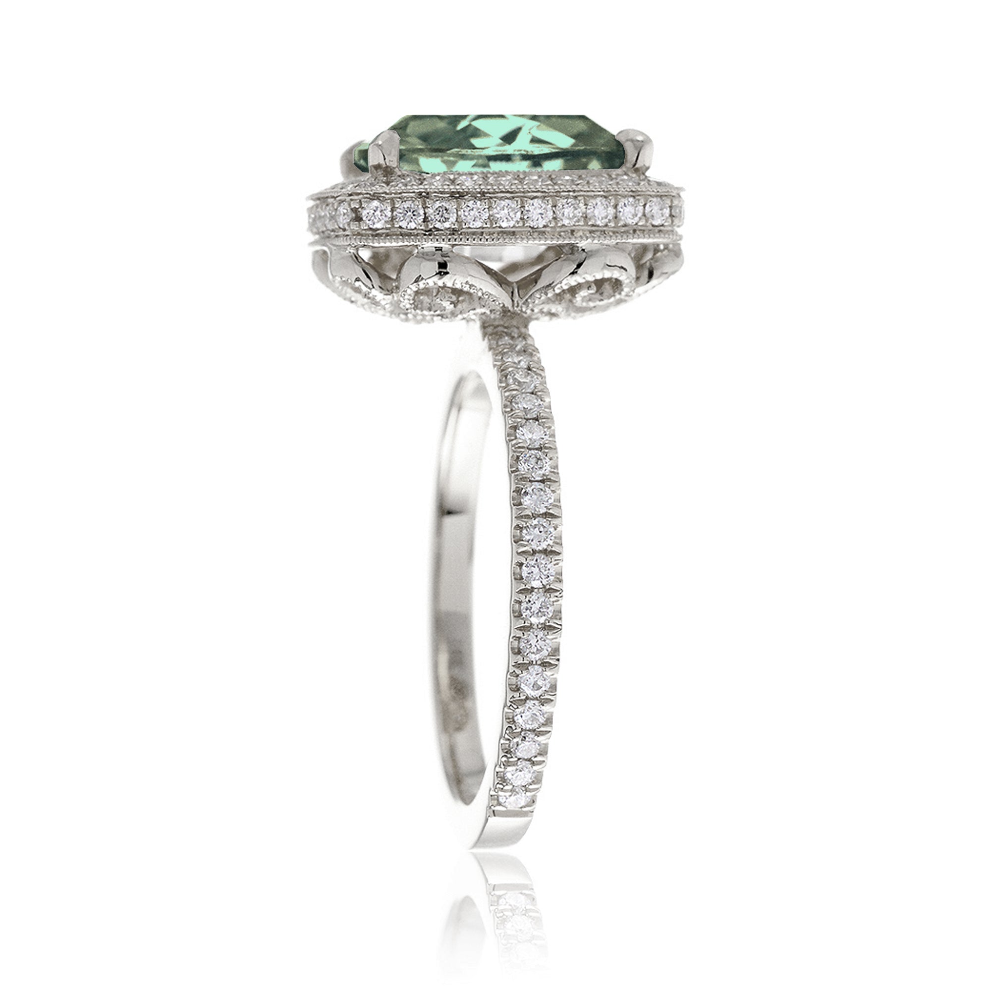 Cushion green sapphire engagement ring with vintage diamond halo and setting white gold