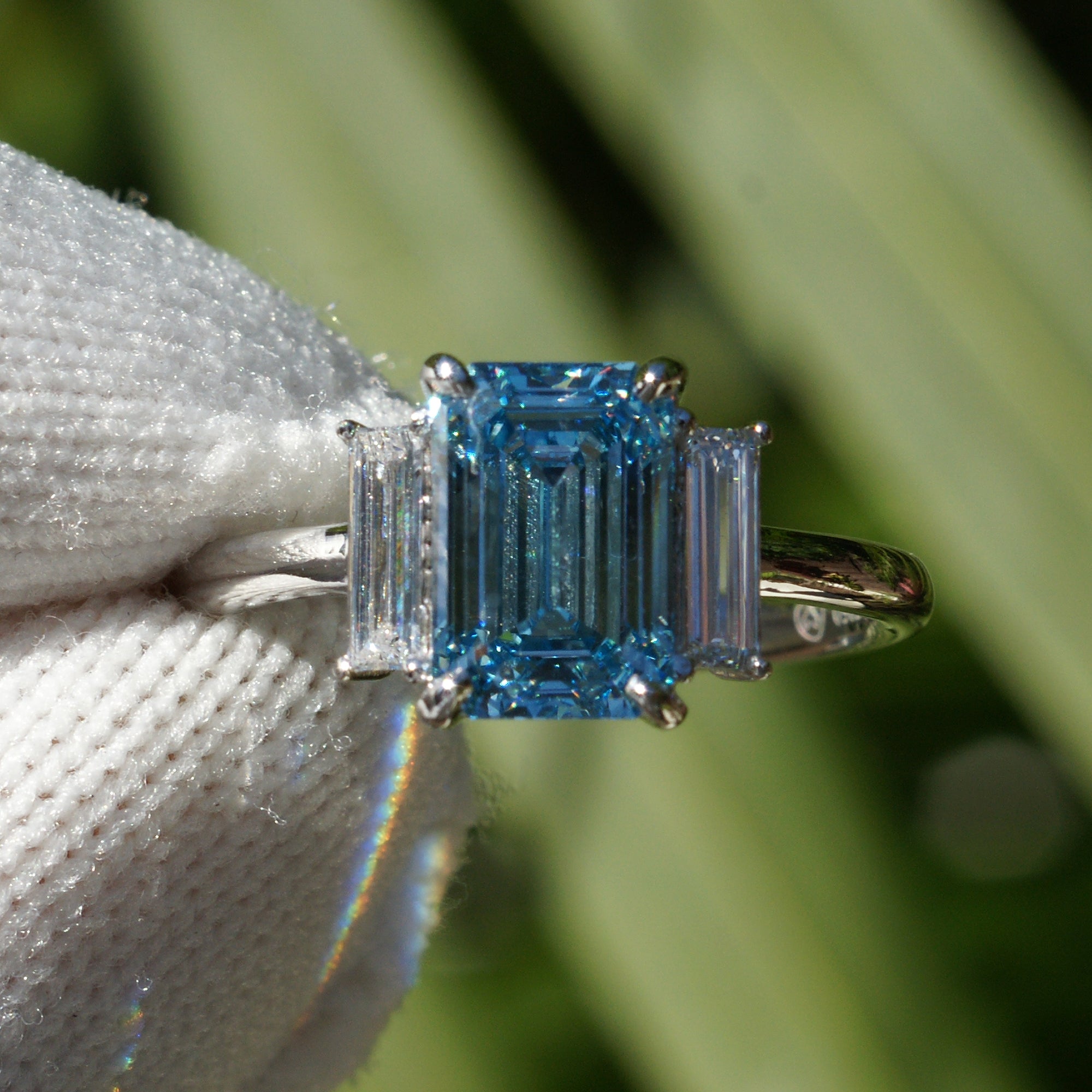 Fancy blue diamond engagement three stone long baguette ring in platinum 2ct to 3ct