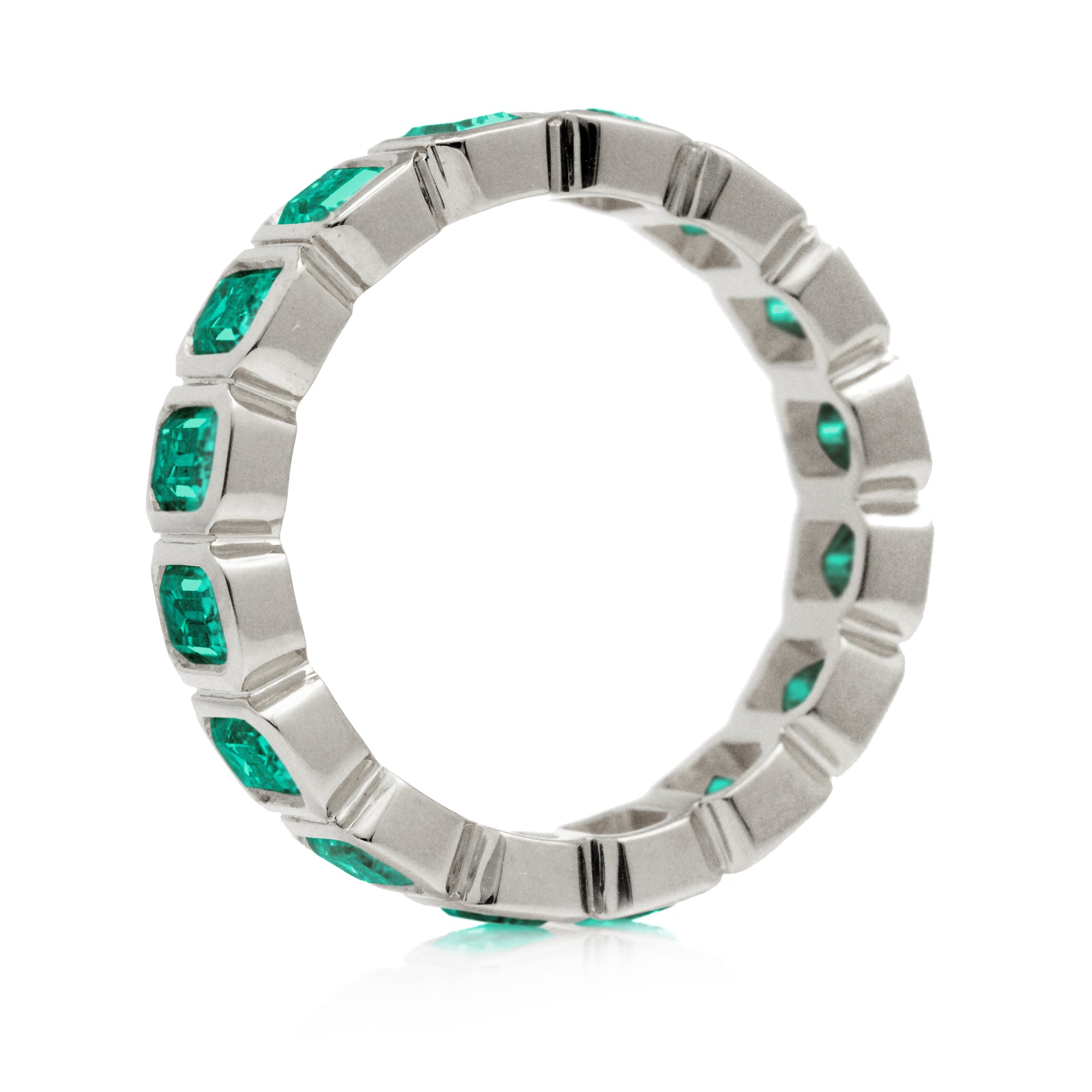 Side View Emerald Cut Emerald Eternity Band in White Gold