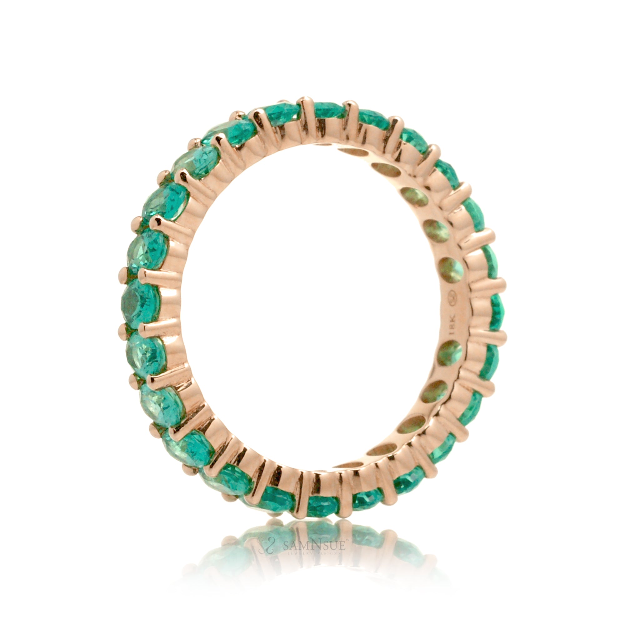 Emerald oval cut eternity band rose gold