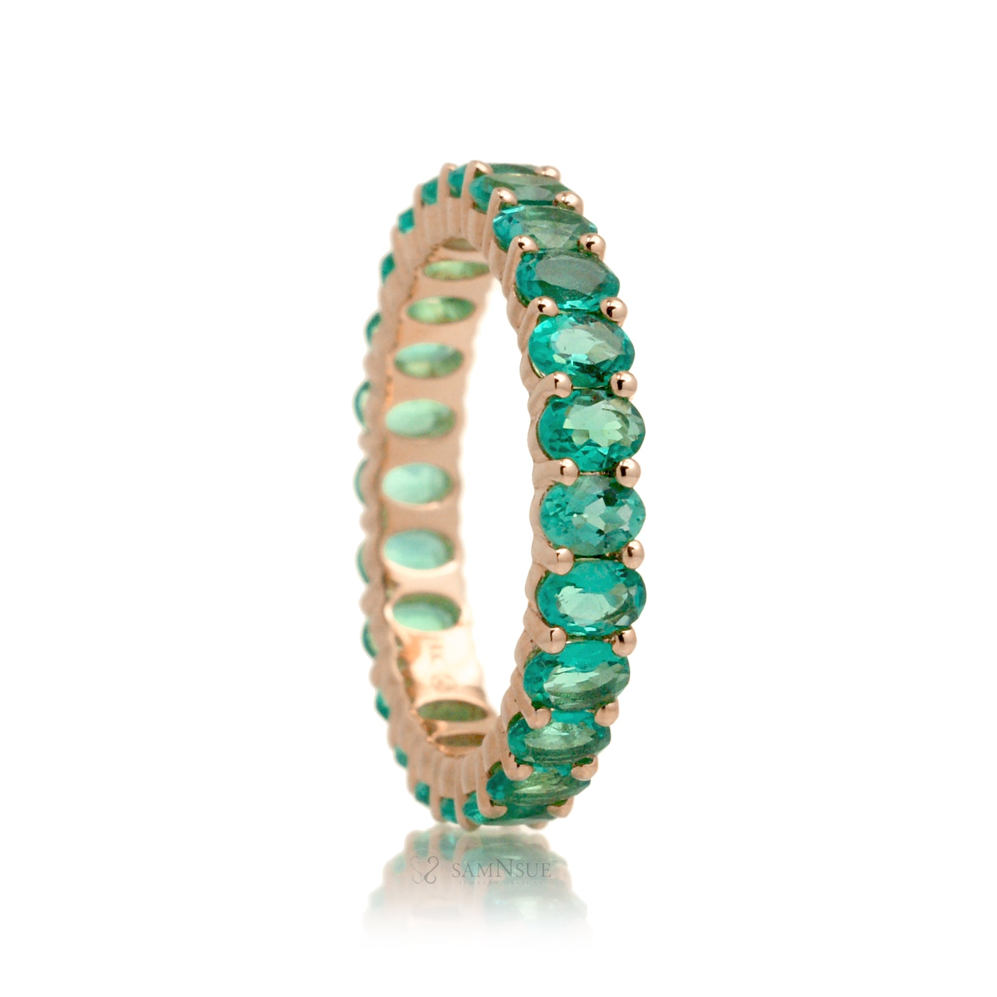 Emerald oval cut eternity band rose gold