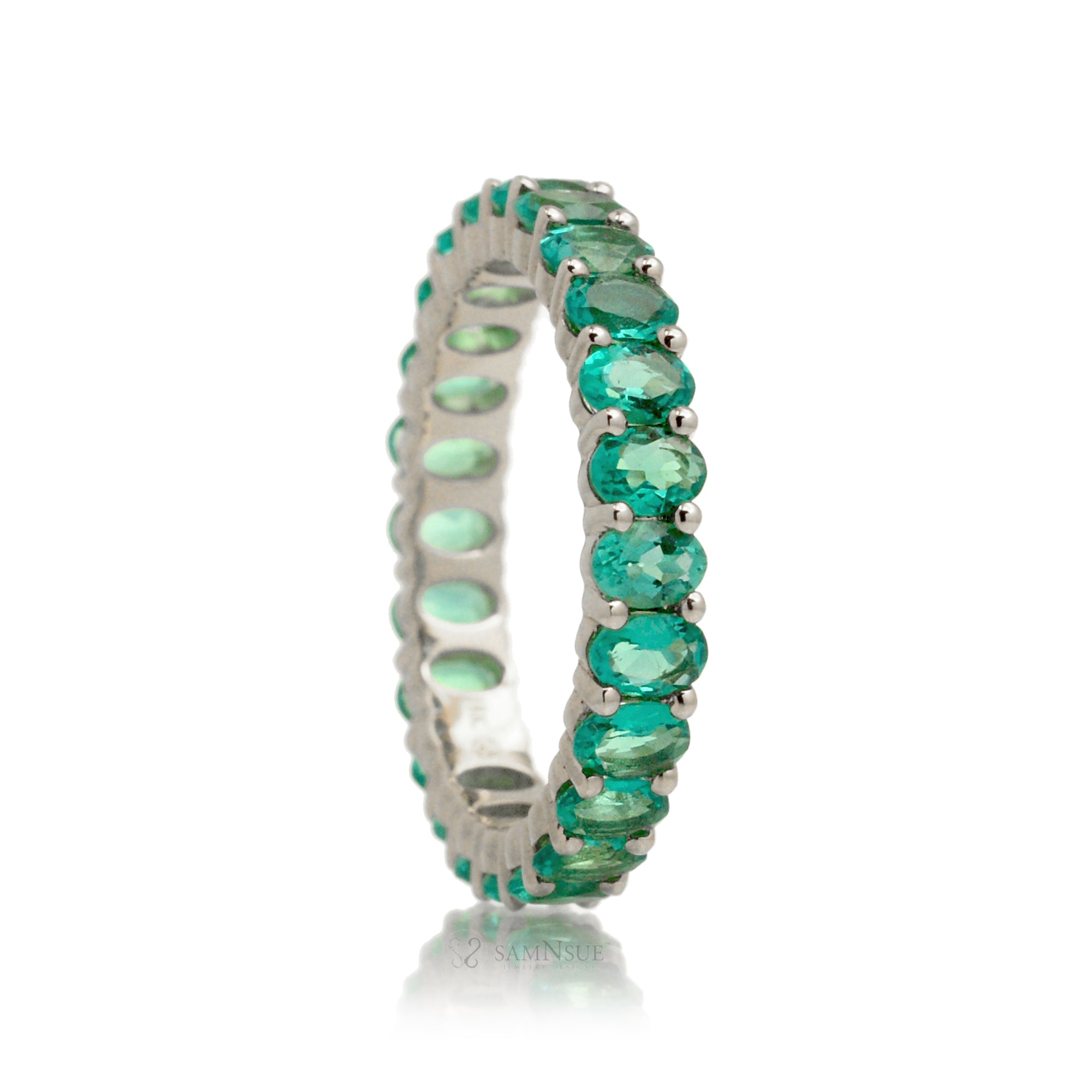 Emerald oval cut eternity band white gold