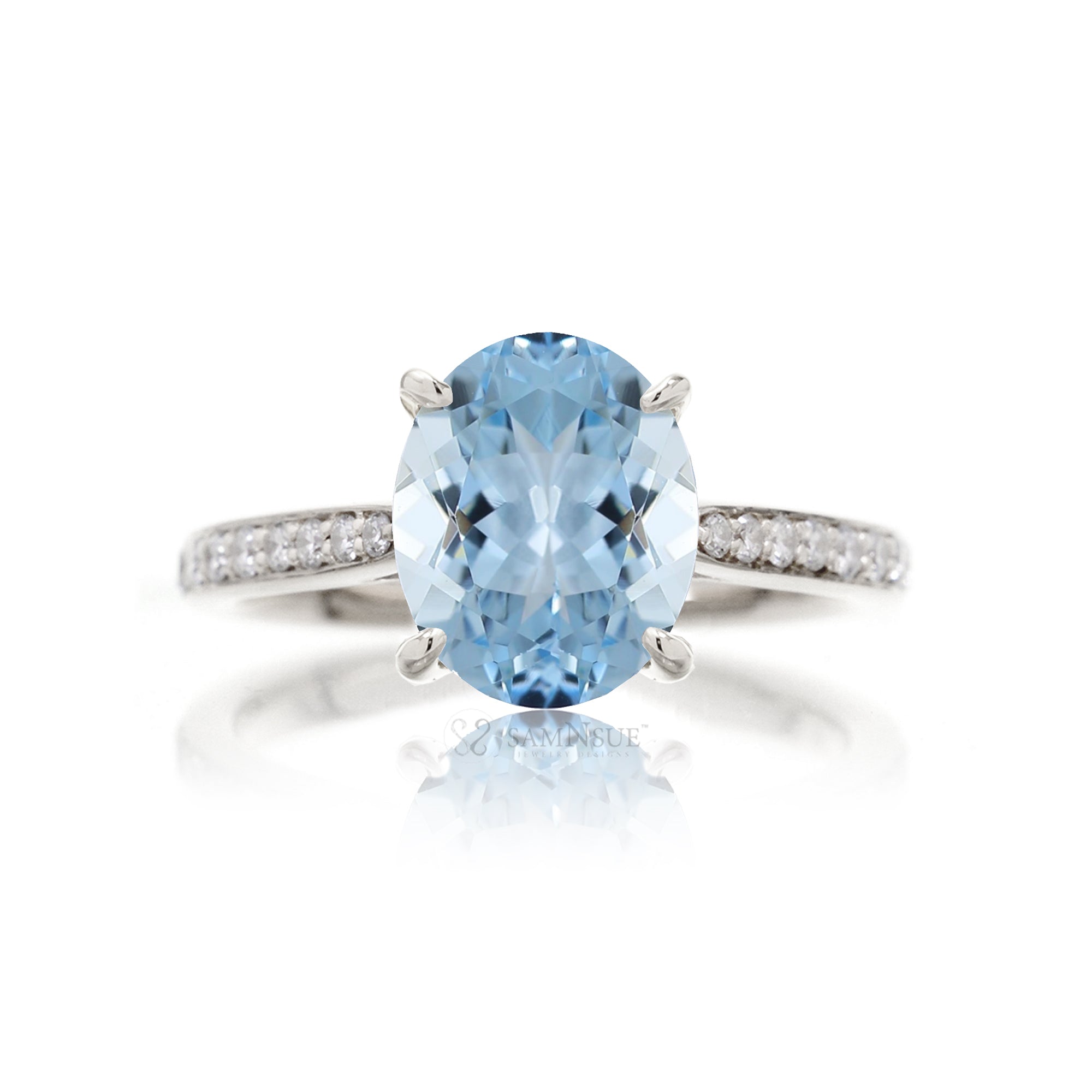 Oval cut aquamarine ring with a diamond solitaire band white gold