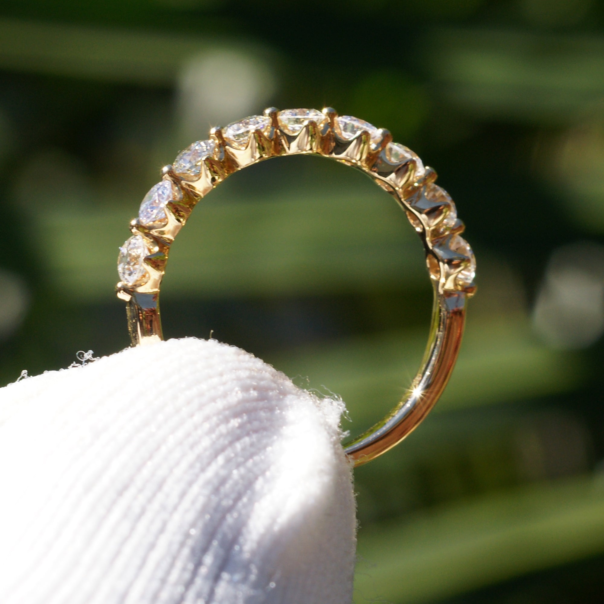 9 round diamond band with crown basket and floating design wedding ring in yellow gold