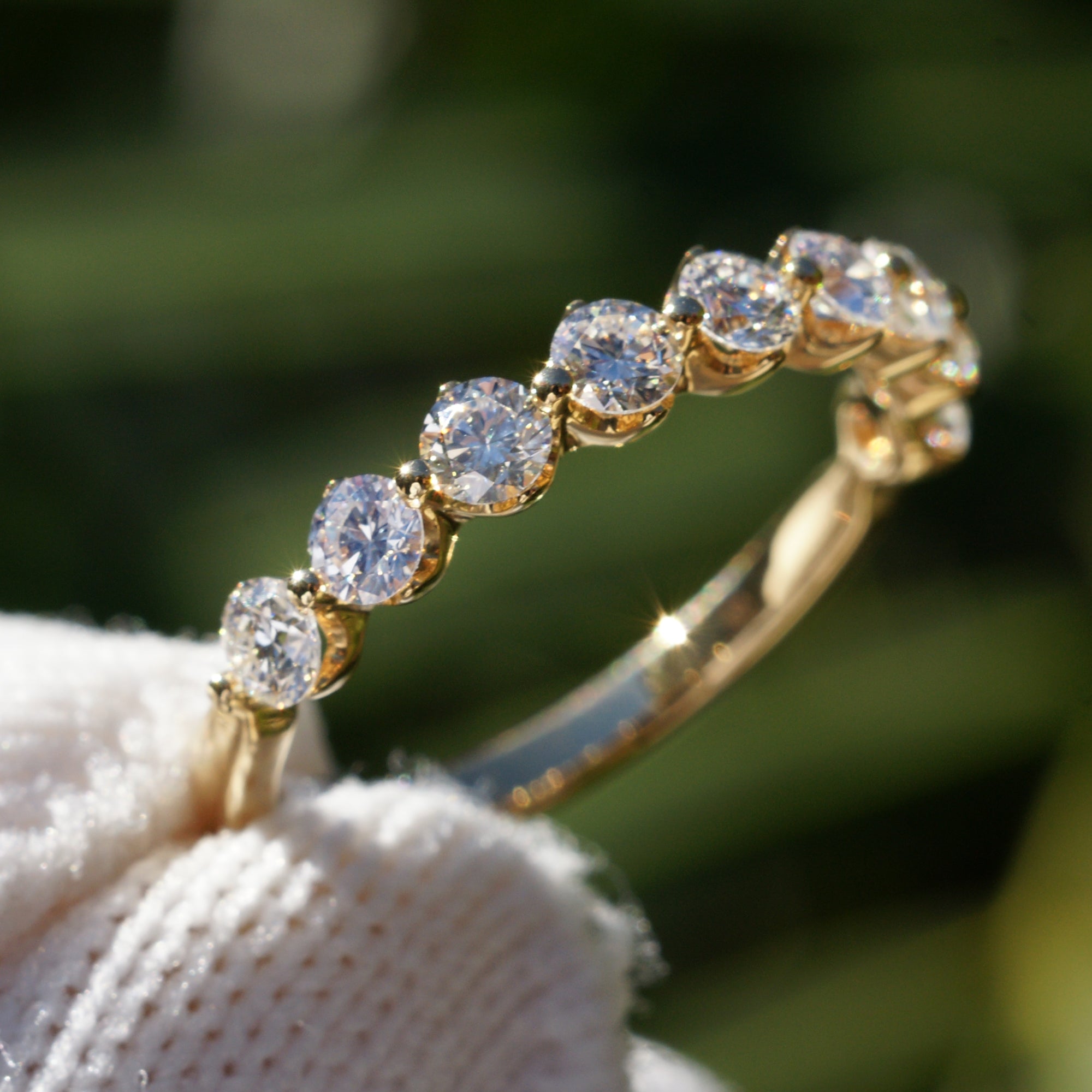 9 round diamond band with crown basket and floating design wedding ring in yellow gold