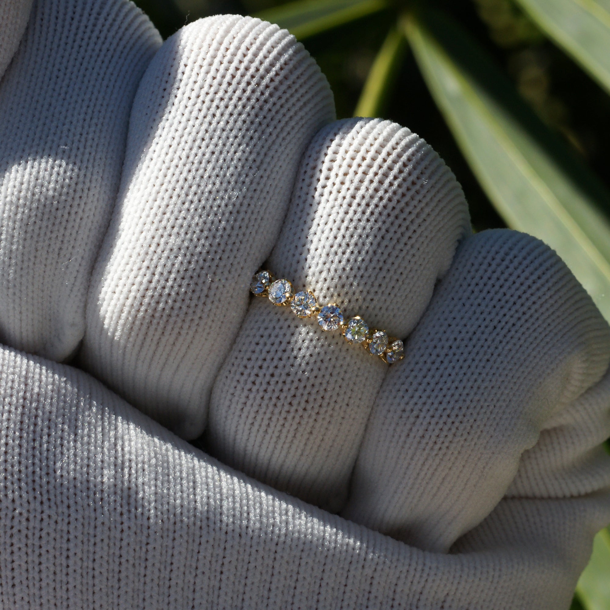 9 round diamond band with crown basket and floating design wedding ring in yellow gold