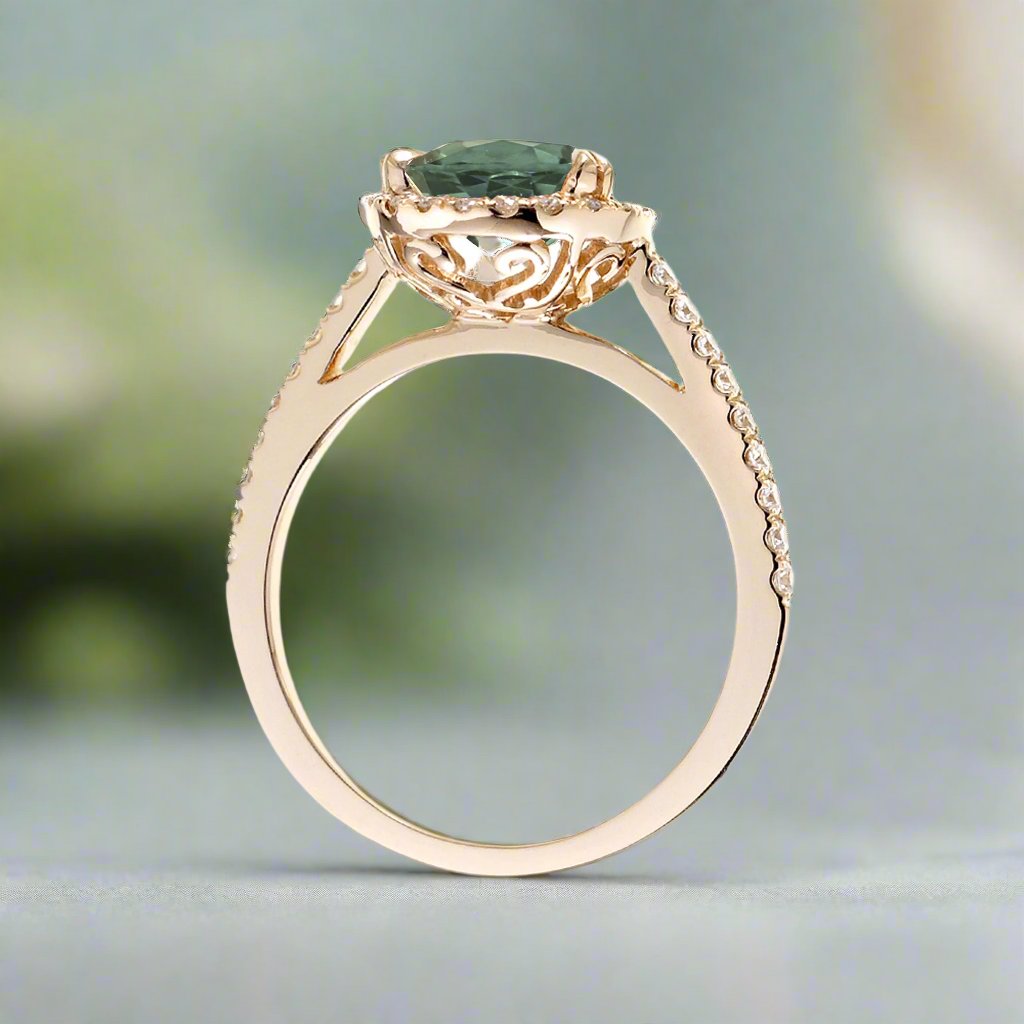 Pear shape green sapphire engagement ring