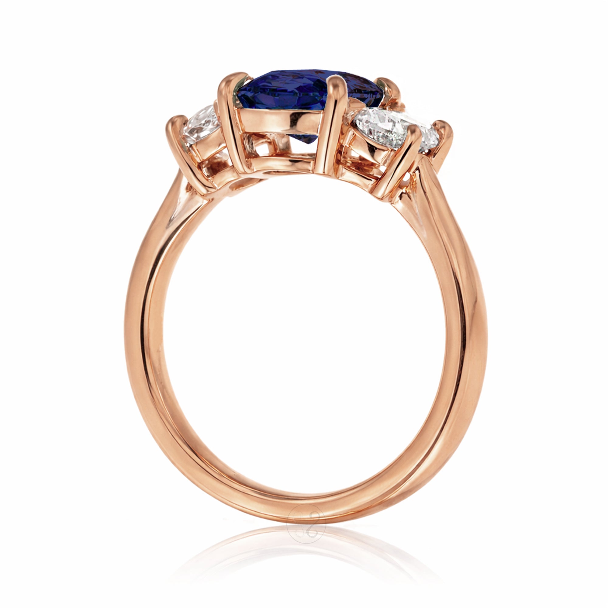 Oval blue sapphire half moon diamond three stone ring rose gold