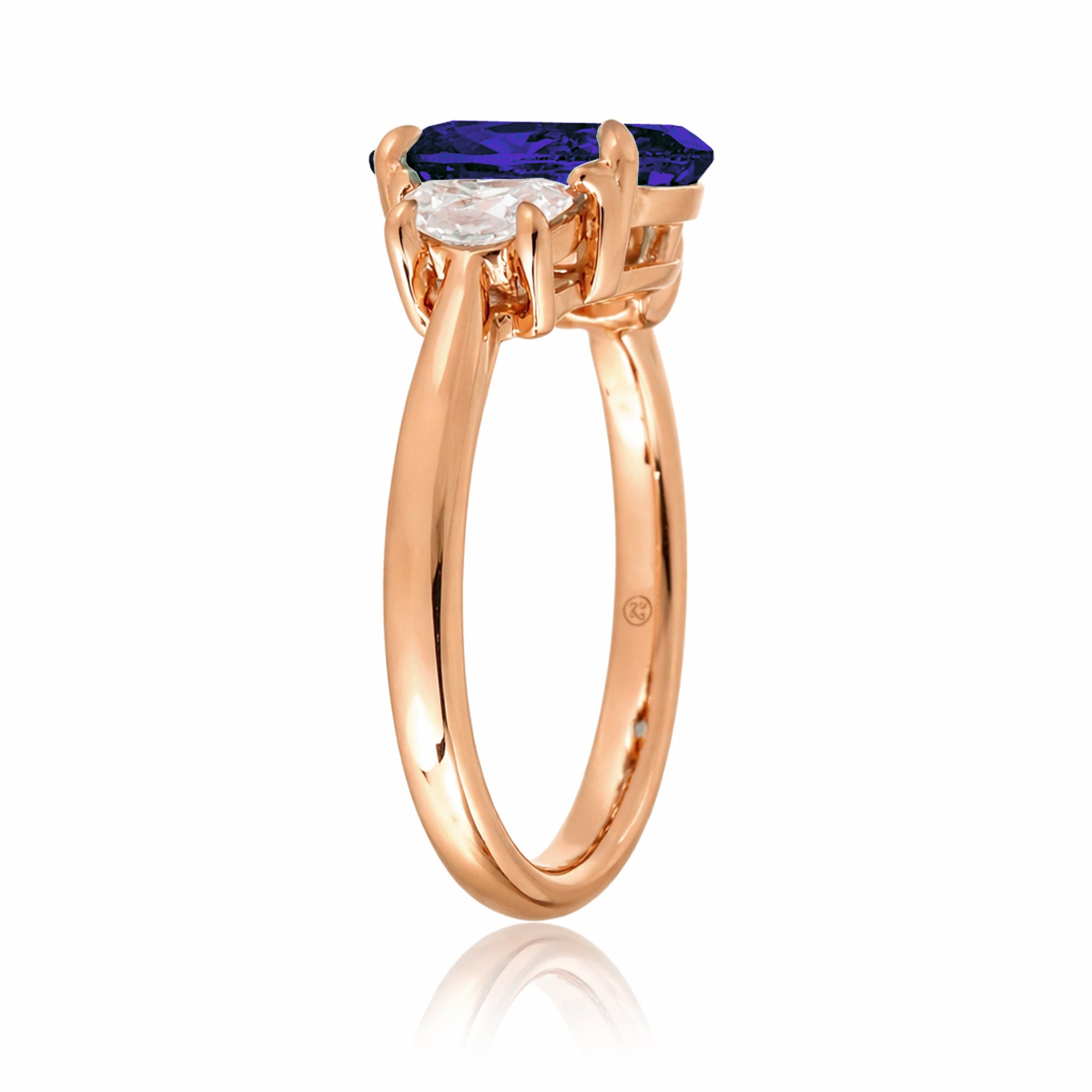 Oval blue sapphire half moon diamond three stone ring rose gold