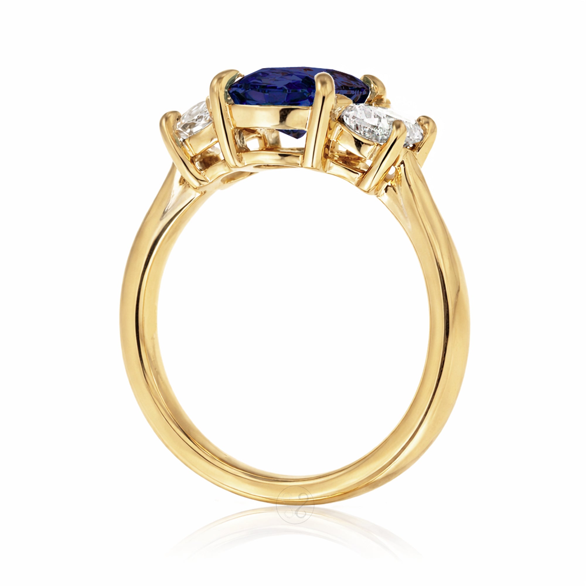 Oval blue sapphire half moon diamond three stone ring yellow gold