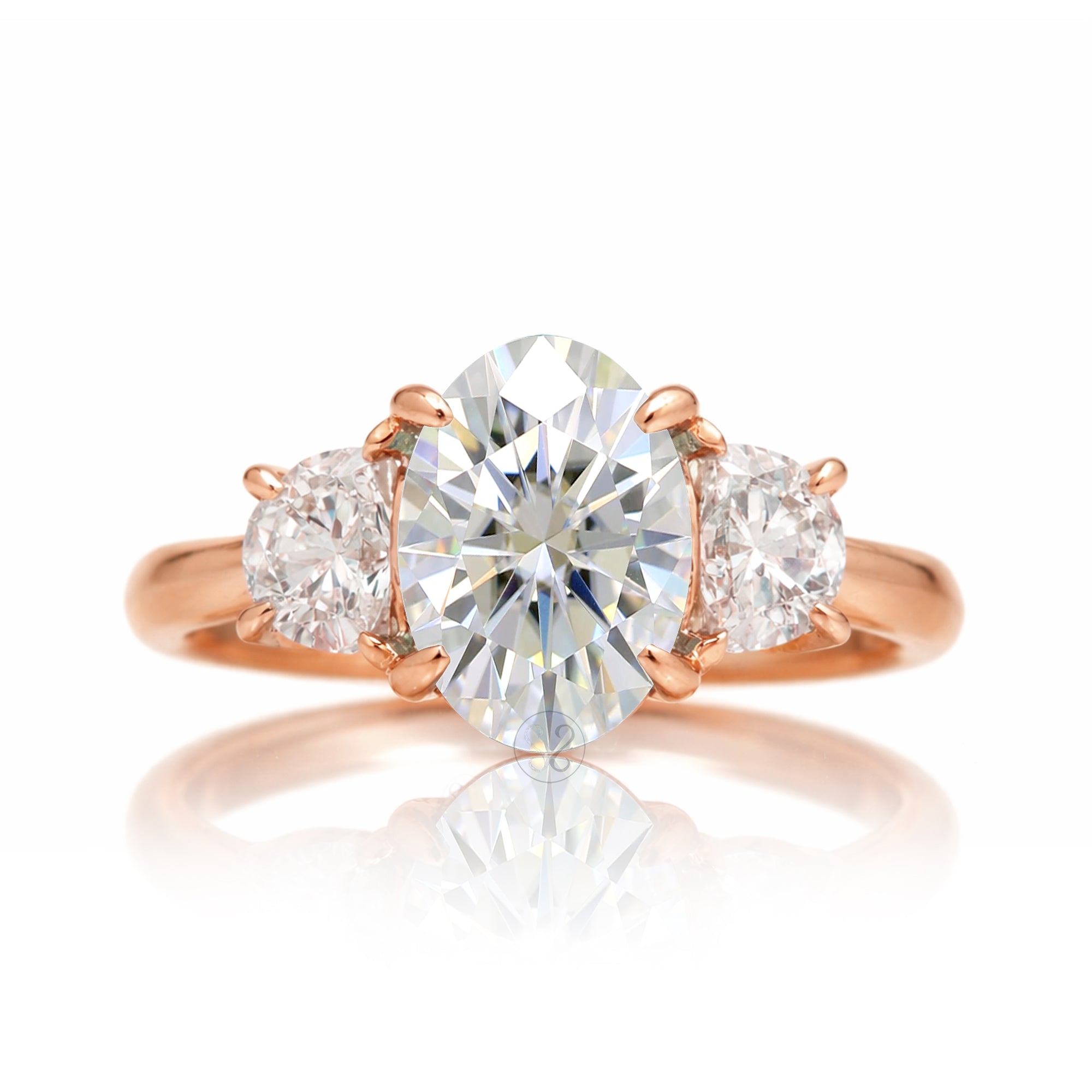 the-claire-three-stone-half-moon-oval-moissanite-ring-rose-gold