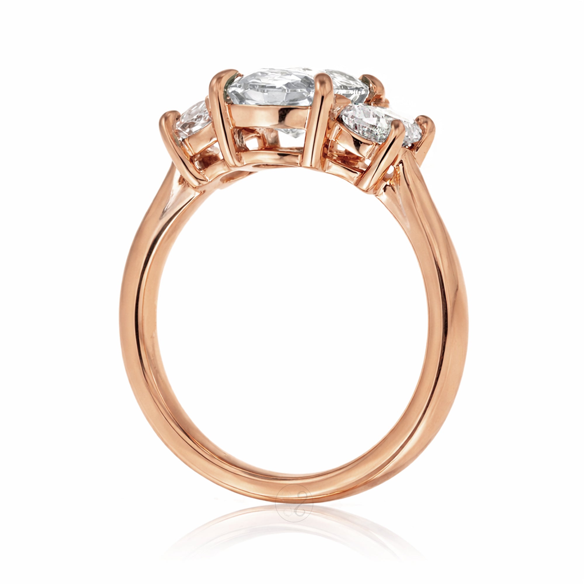 the-claire-three-stone-half-moon-oval-moissanite-ring-rose-gold