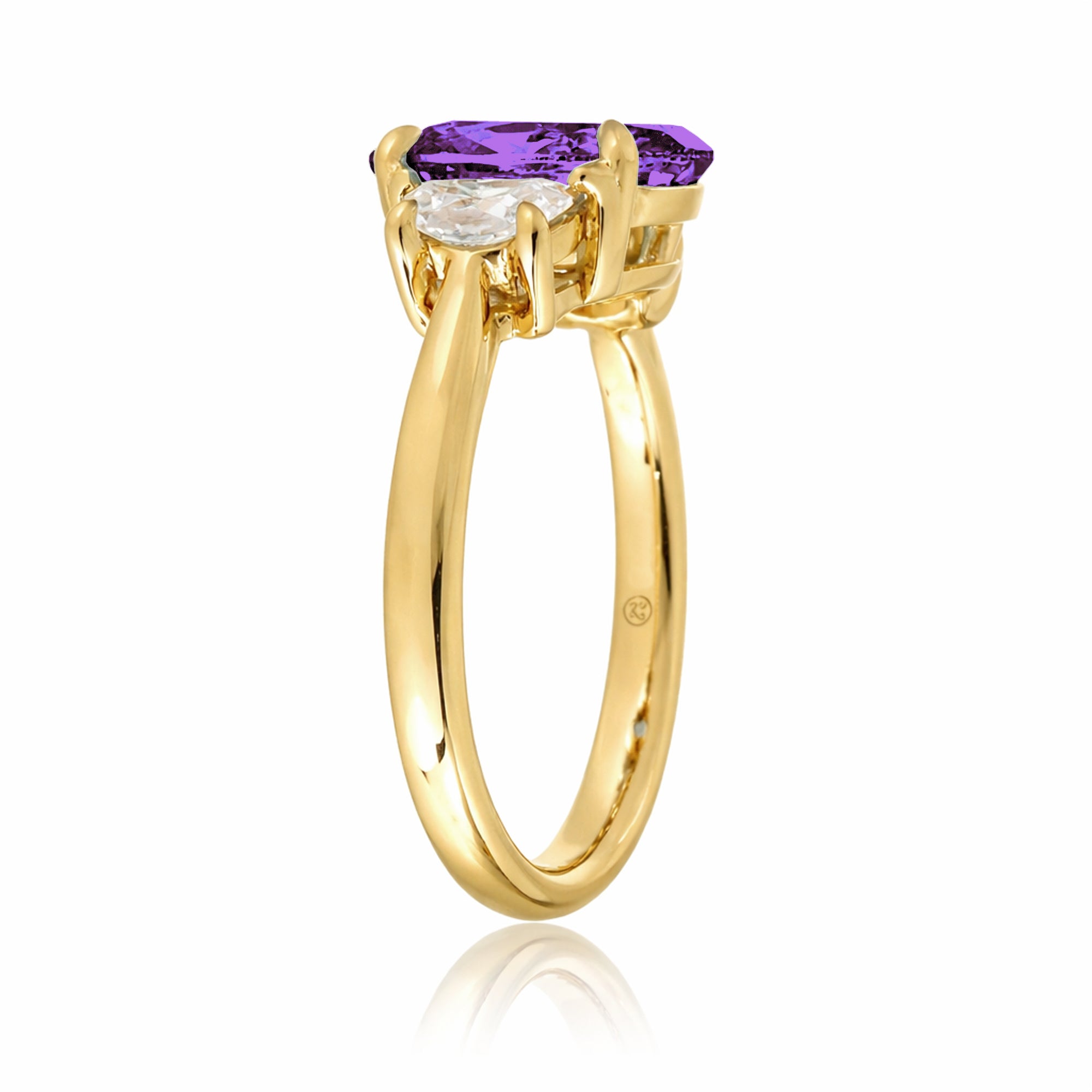Purple sapphire three stone ring with half moon diamond past present future yellow gold