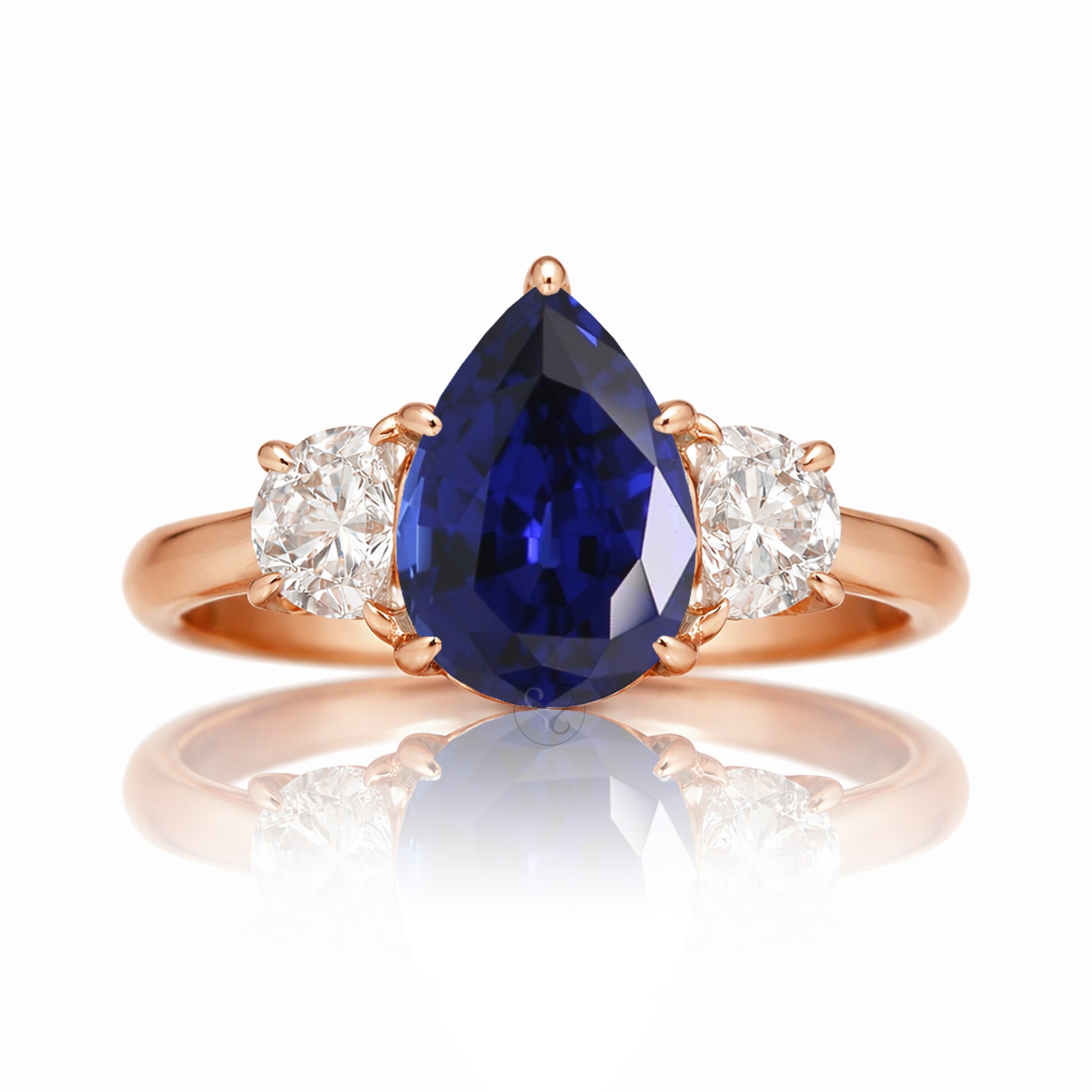 Oval blue sapphire half moon diamond three stone ring rose gold