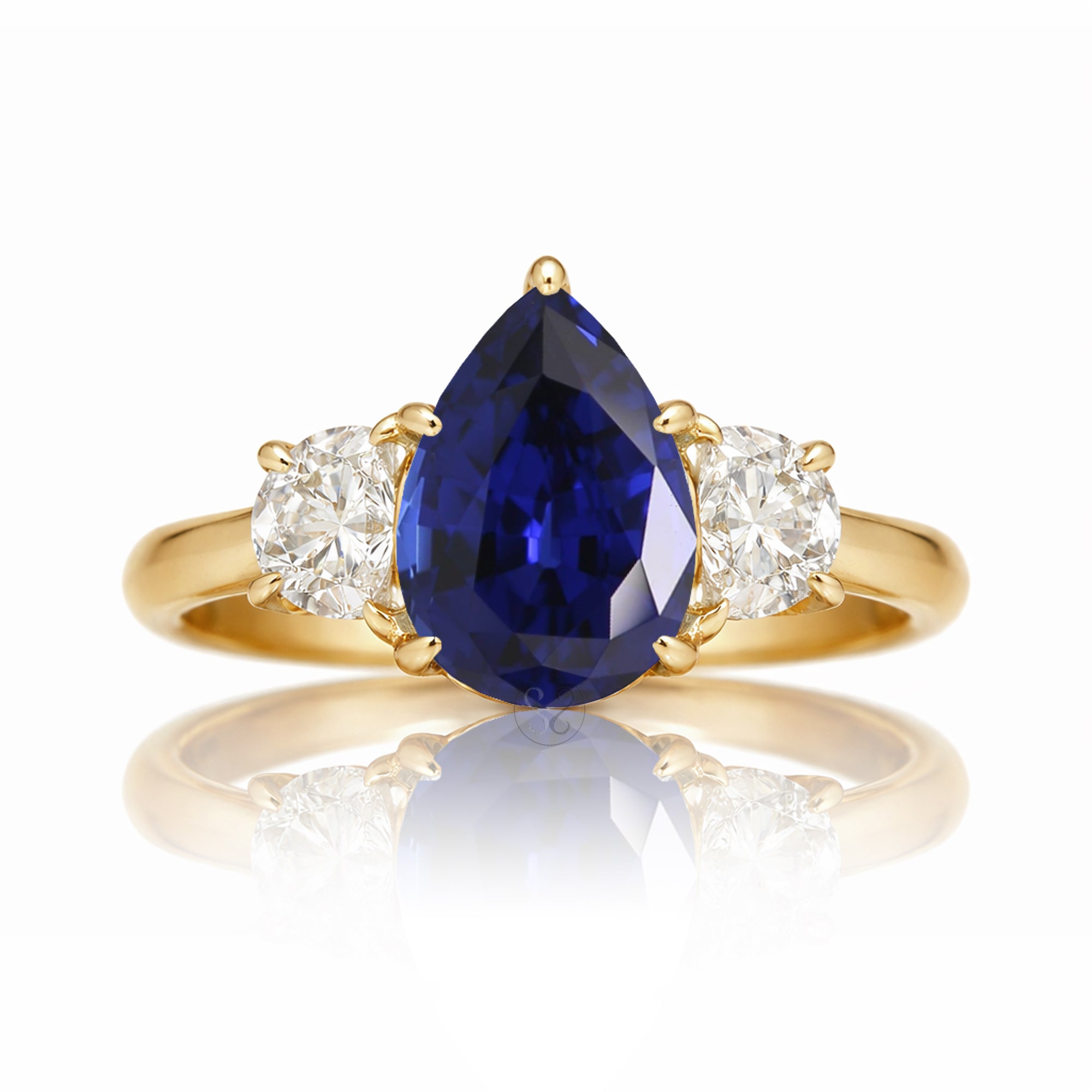 Oval blue sapphire half moon diamond three stone ring yellow gold
