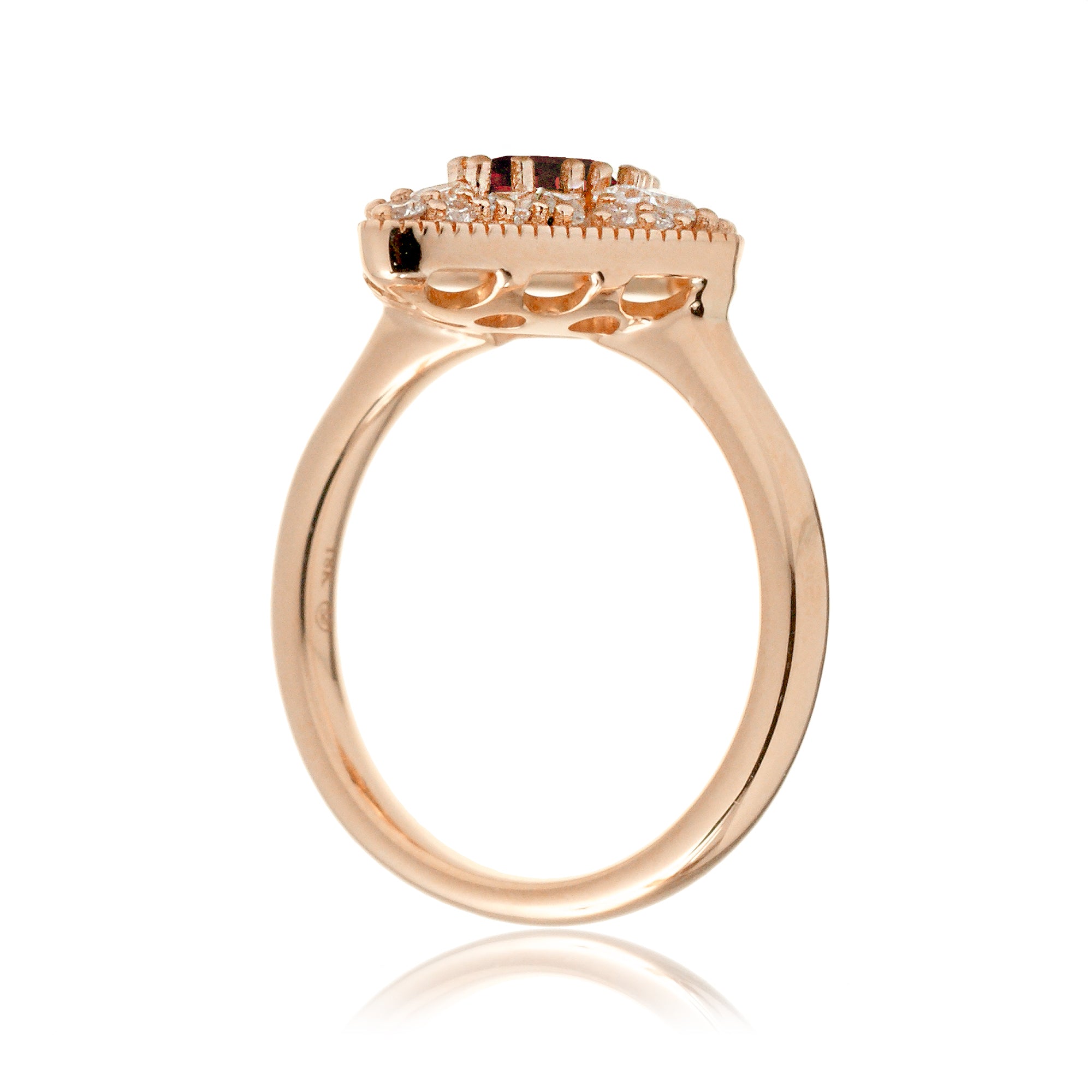 Kite cut ruby and diamond halo ring rose gold vintage style