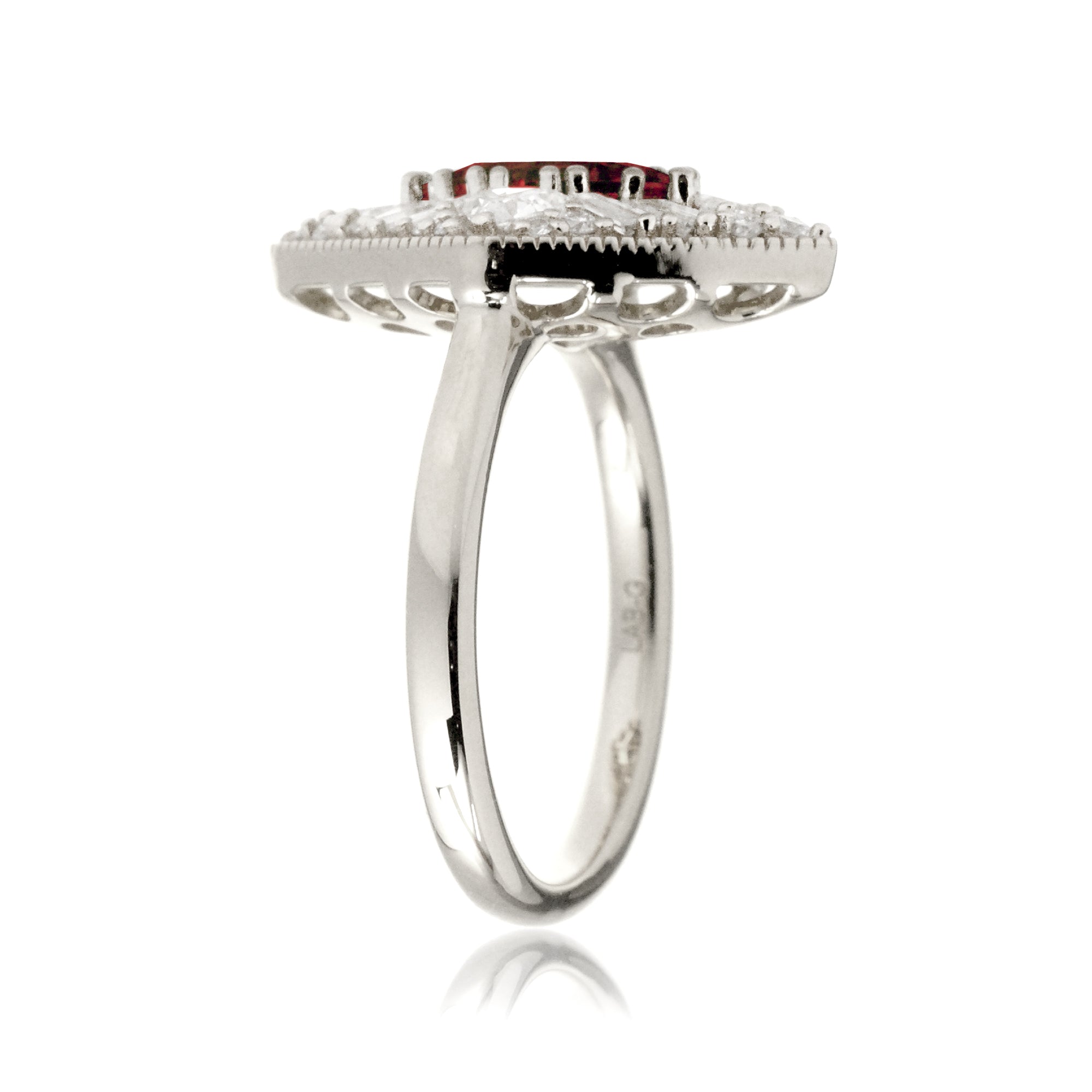 Kite cut ruby and diamond halo ring white gold vintage style