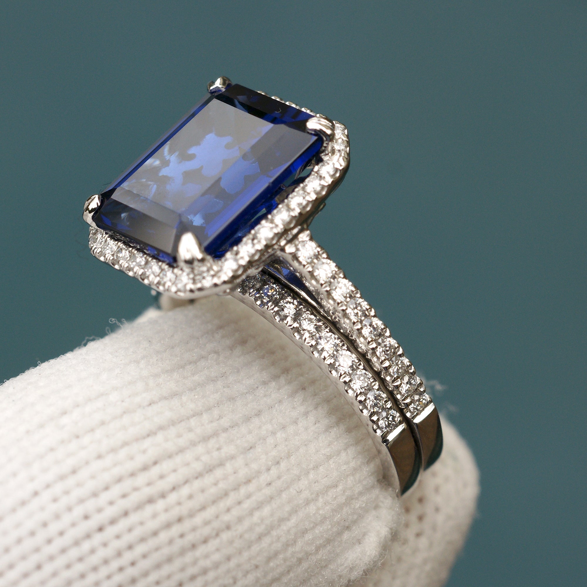Blue sapphire emerald cut diamond halo and band wedding engagement ring set