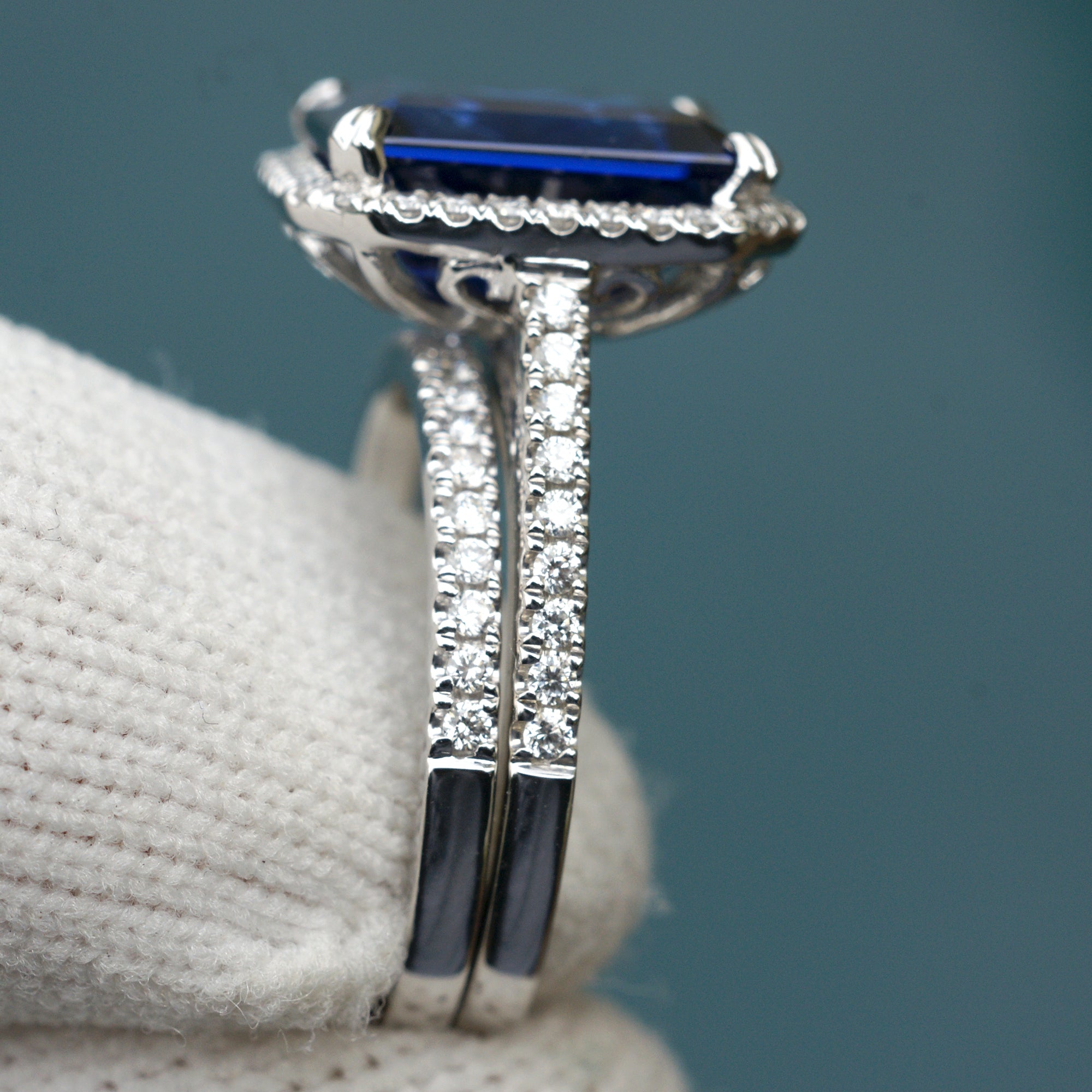 Blue sapphire emerald cut diamond halo and band wedding engagement ring set