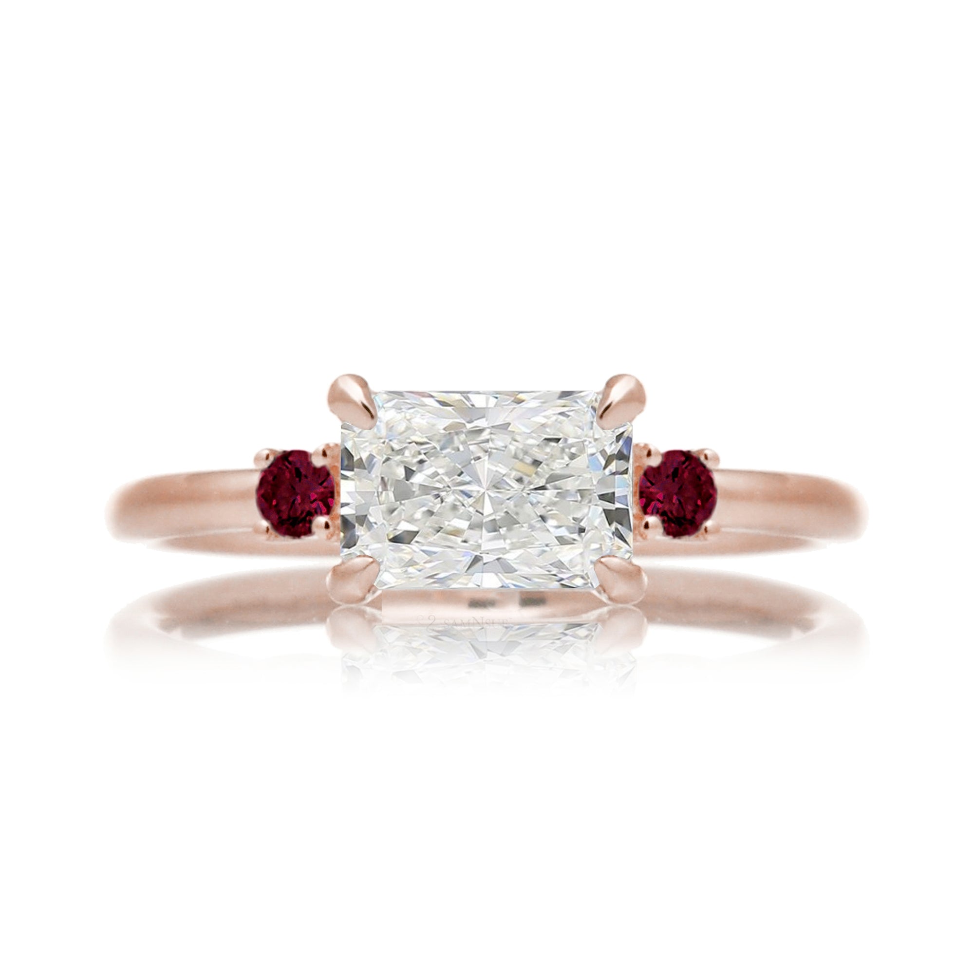 east-west radiant cut lab-grown diamond threestone ring with red ruby rose gold