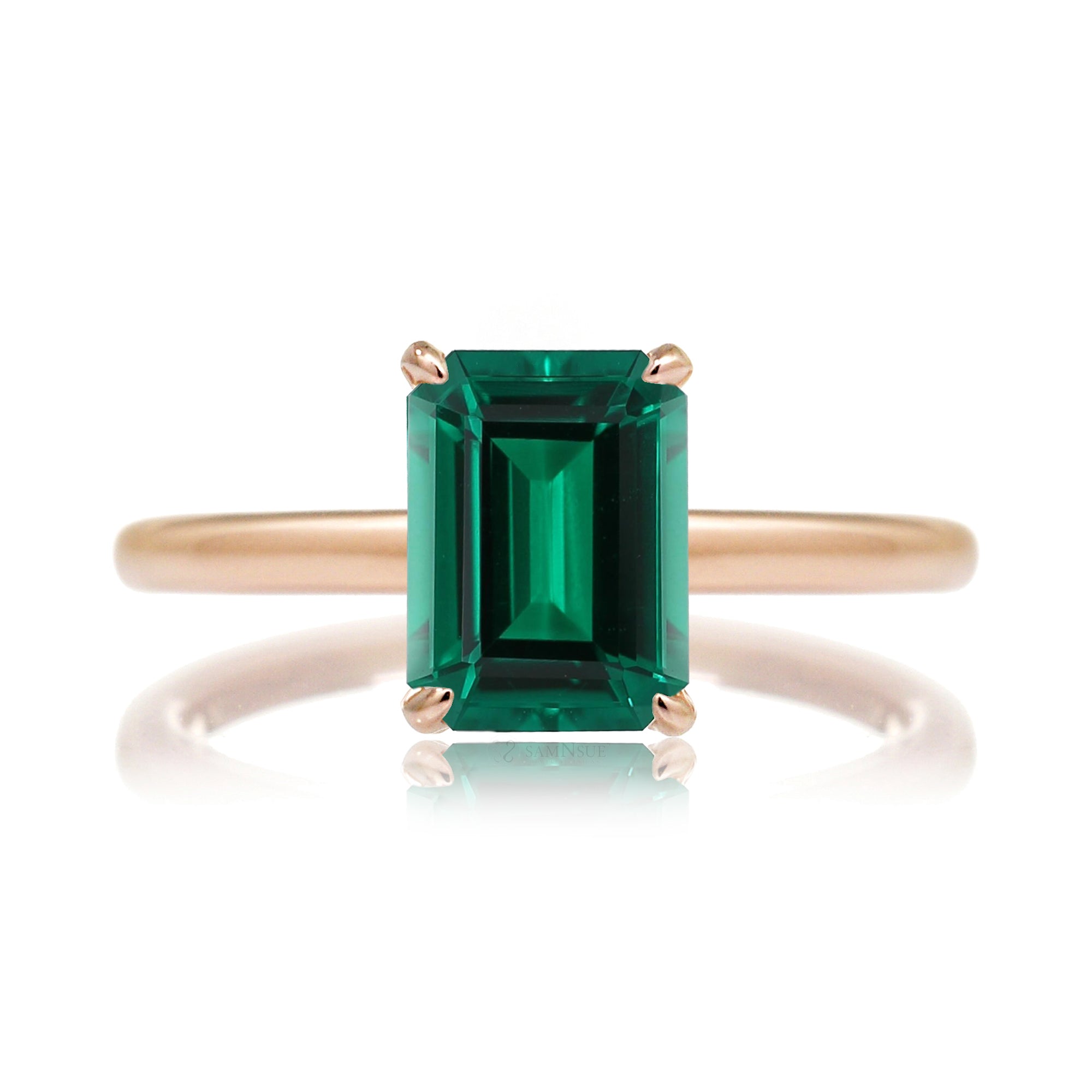 Emerald step cut green emerald ring with diamond hidden halo on rose gold