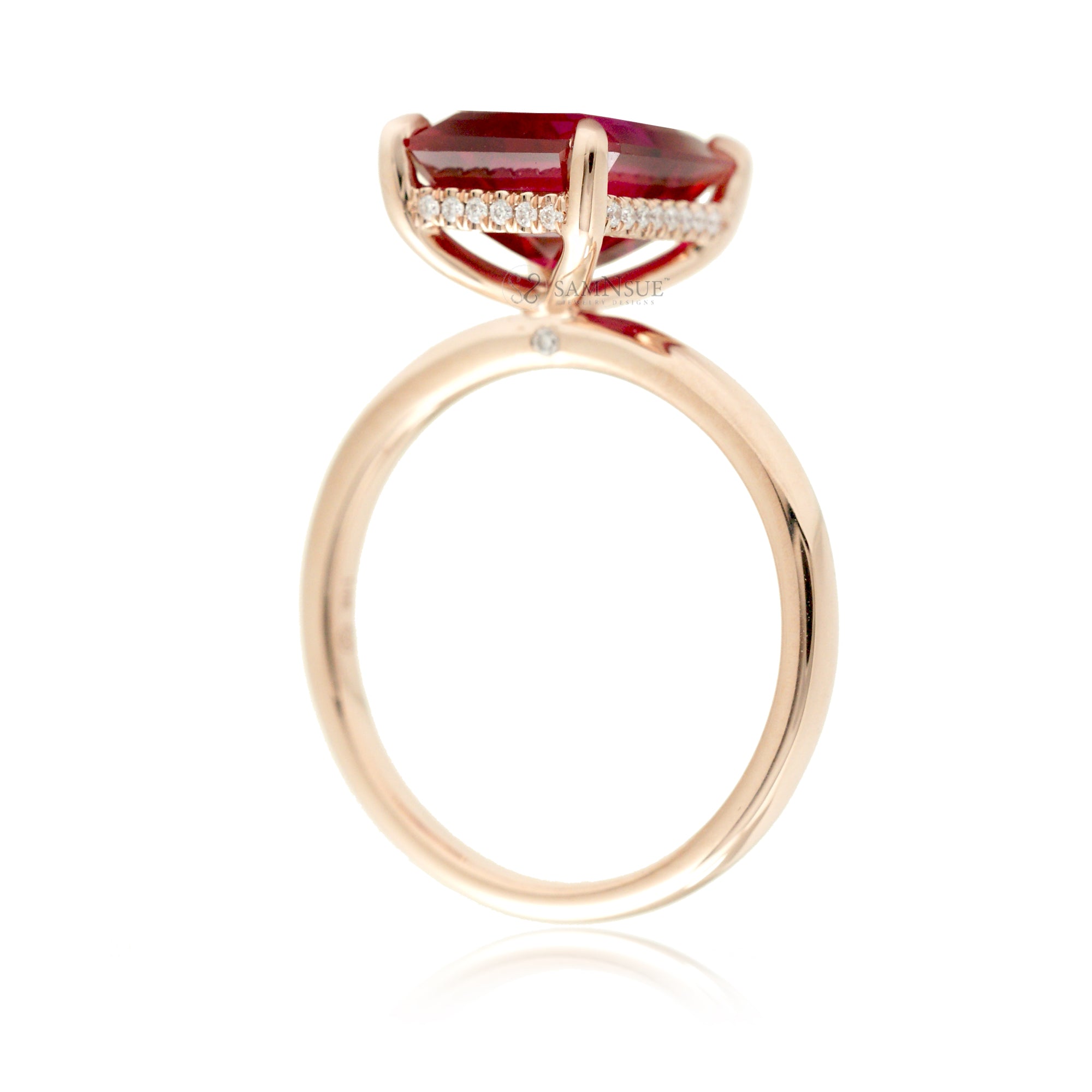 Emerald step cut ruby diamond hidden halo engagement ring in rose gold