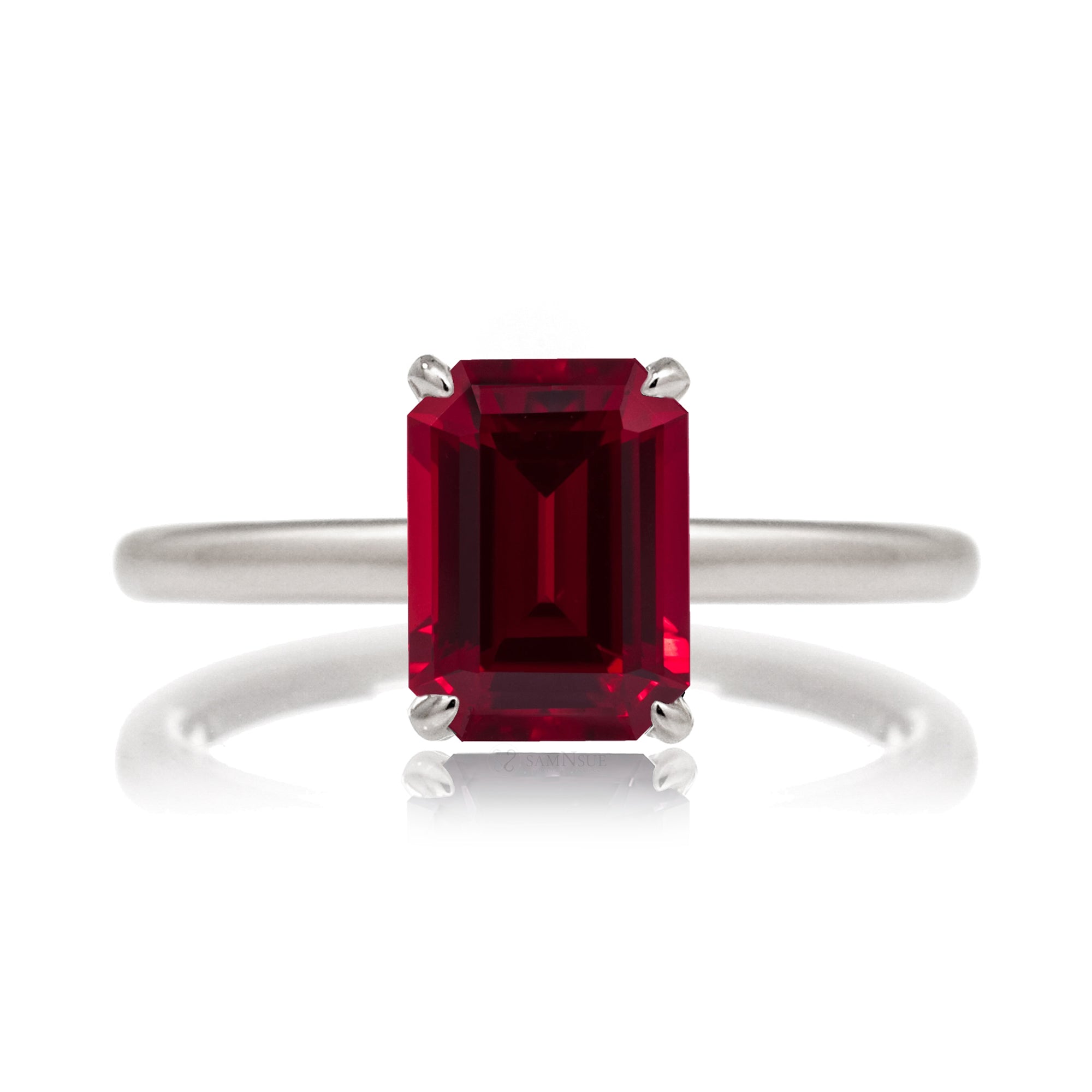 Emerald step cut ruby diamond hidden halo engagement ring in white gold