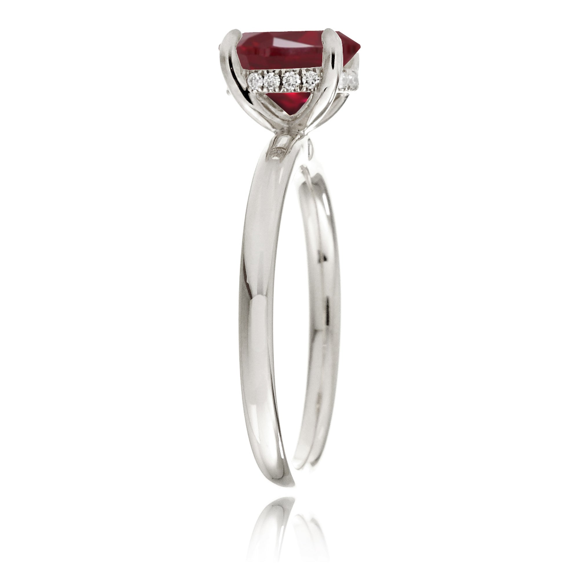 Emerald step cut ruby diamond hidden halo engagement ring in white gold