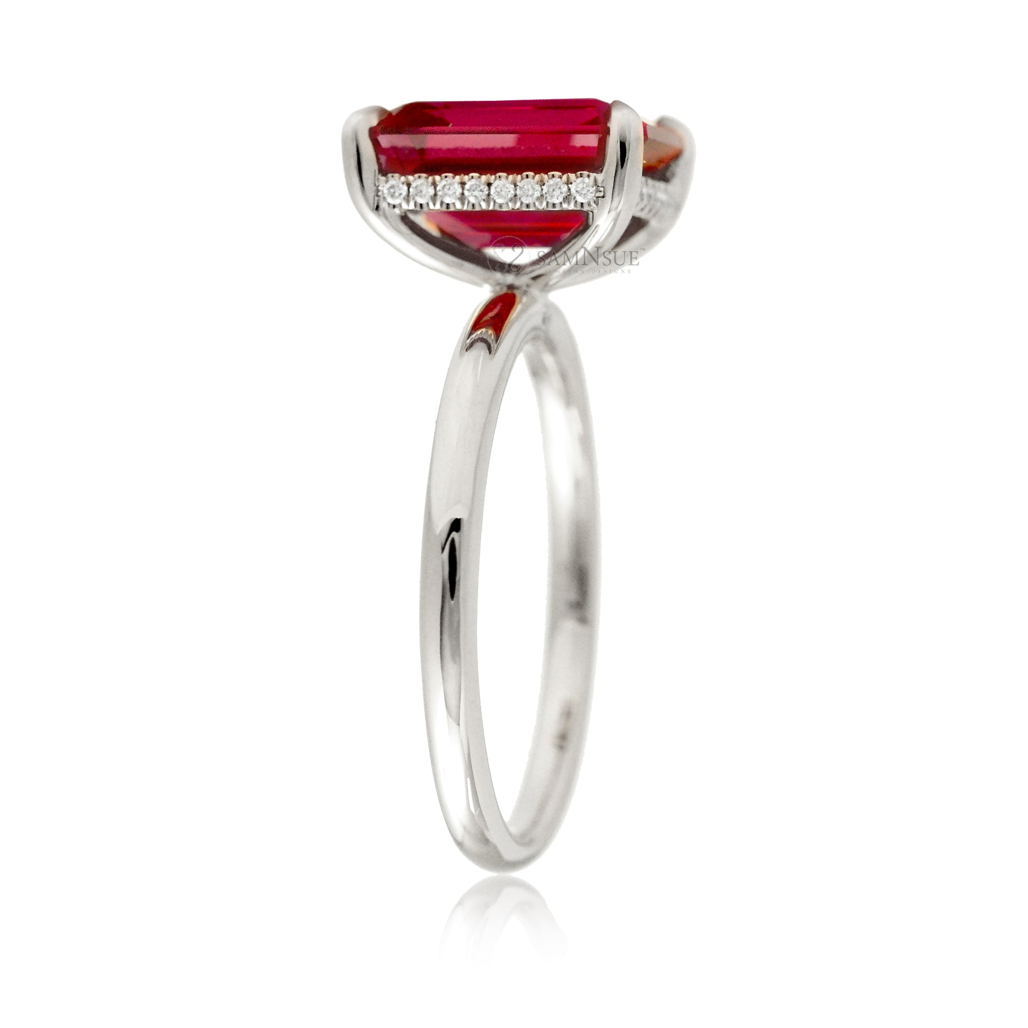 Emerald step cut ruby diamond hidden halo engagement ring in white gold