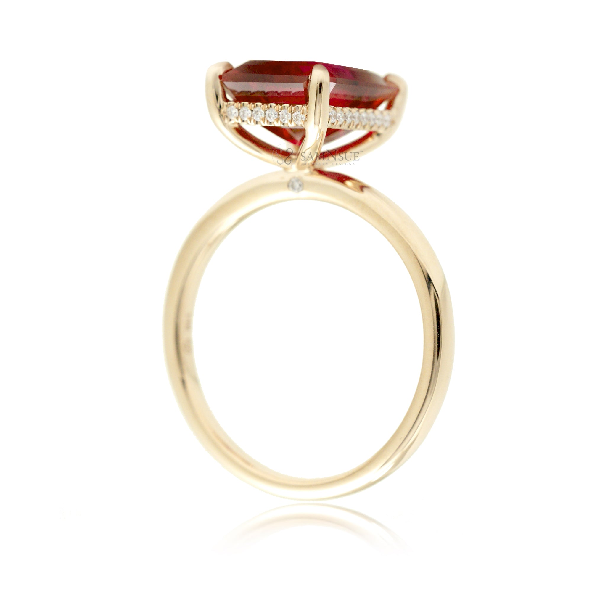 Emerald step cut ruby diamond hidden halo engagement ring in yellow gold