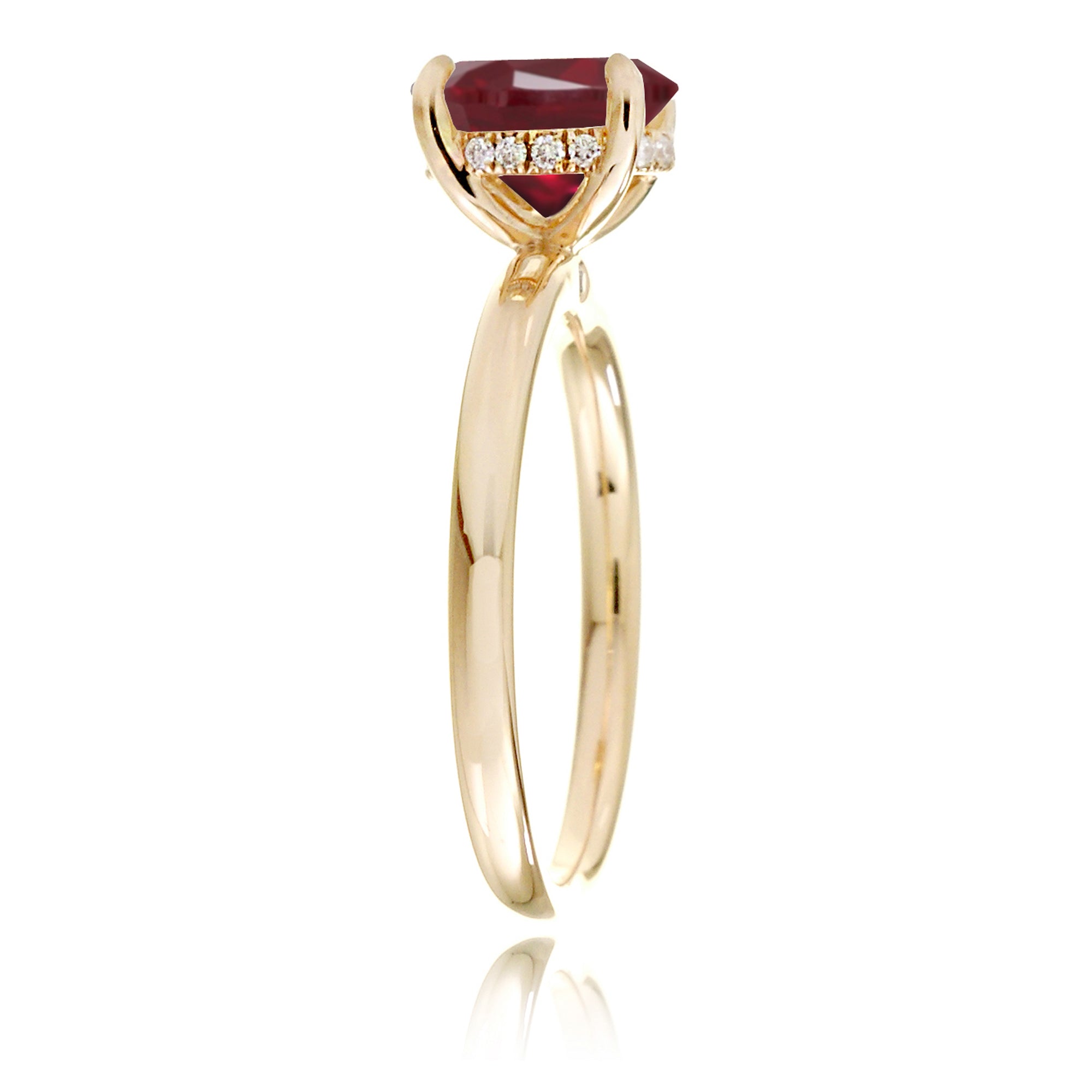 Emerald step cut ruby diamond hidden halo engagement ring in yellow gold