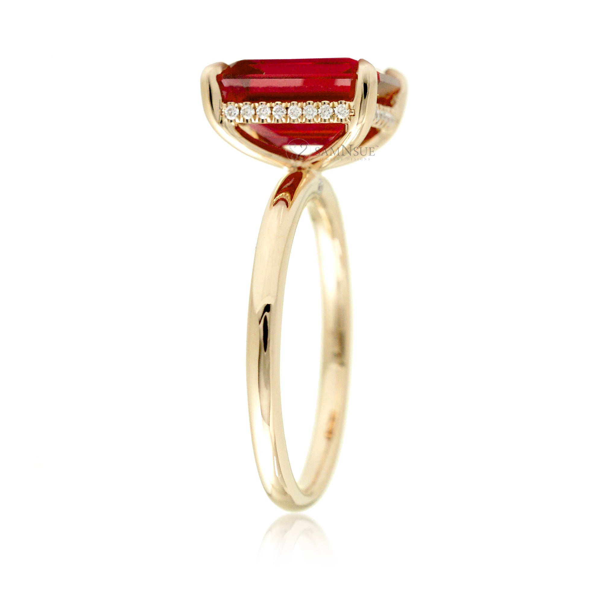 Emerald step cut ruby diamond hidden halo engagement ring in yellow gold