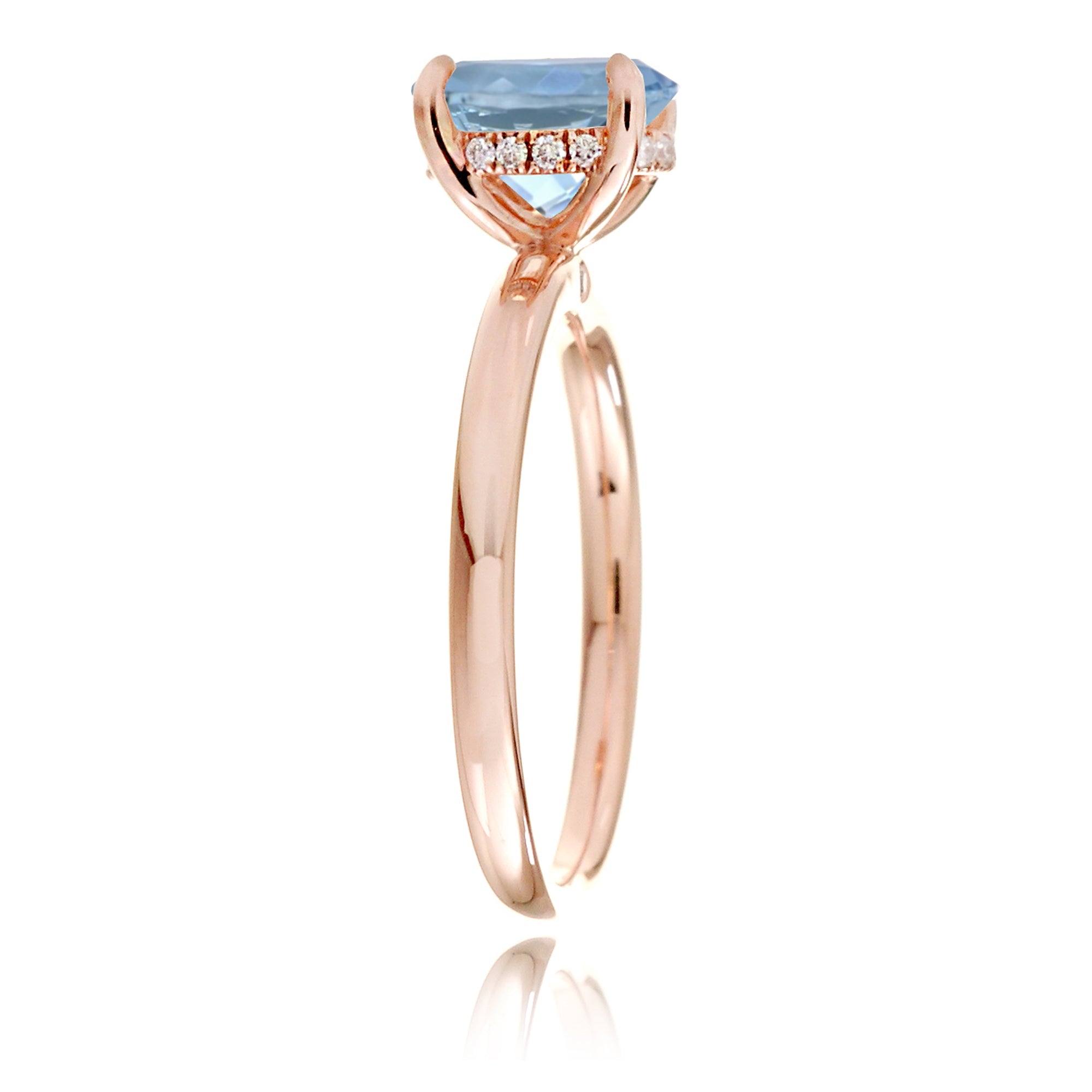 Oval aquamarine ring with diamond hidden halo and rounded band rose gold