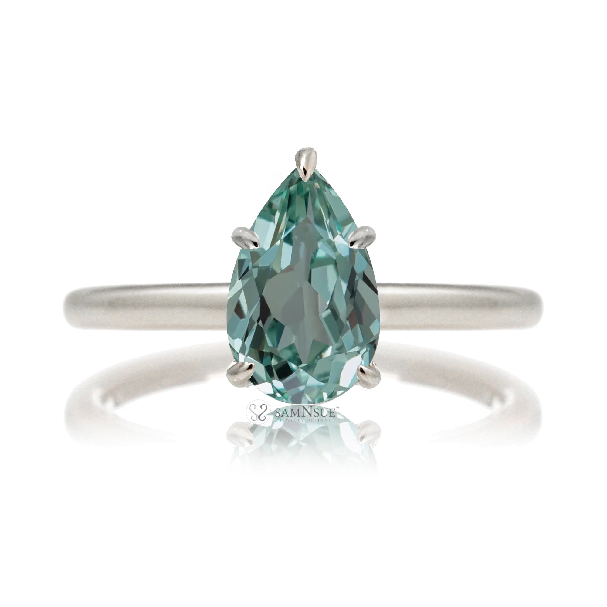 Pear green sapphire solitaire engagement ring in white gold