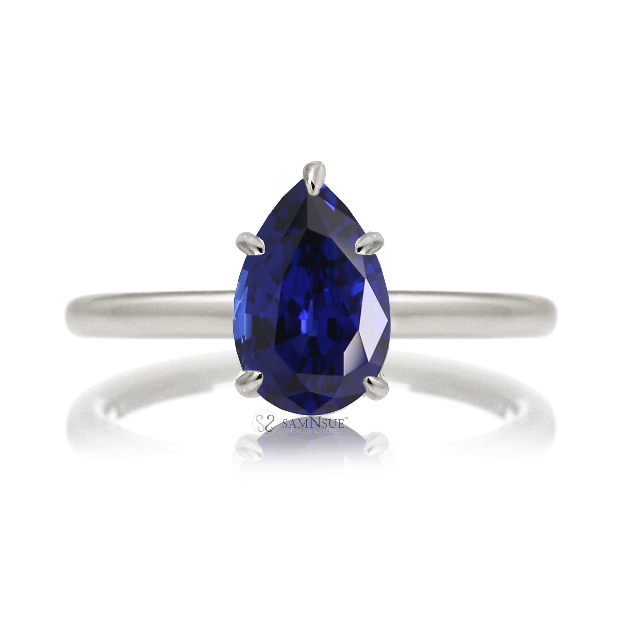 Pear blue sapphire solitaire engagement ring in white gold with hidden halo