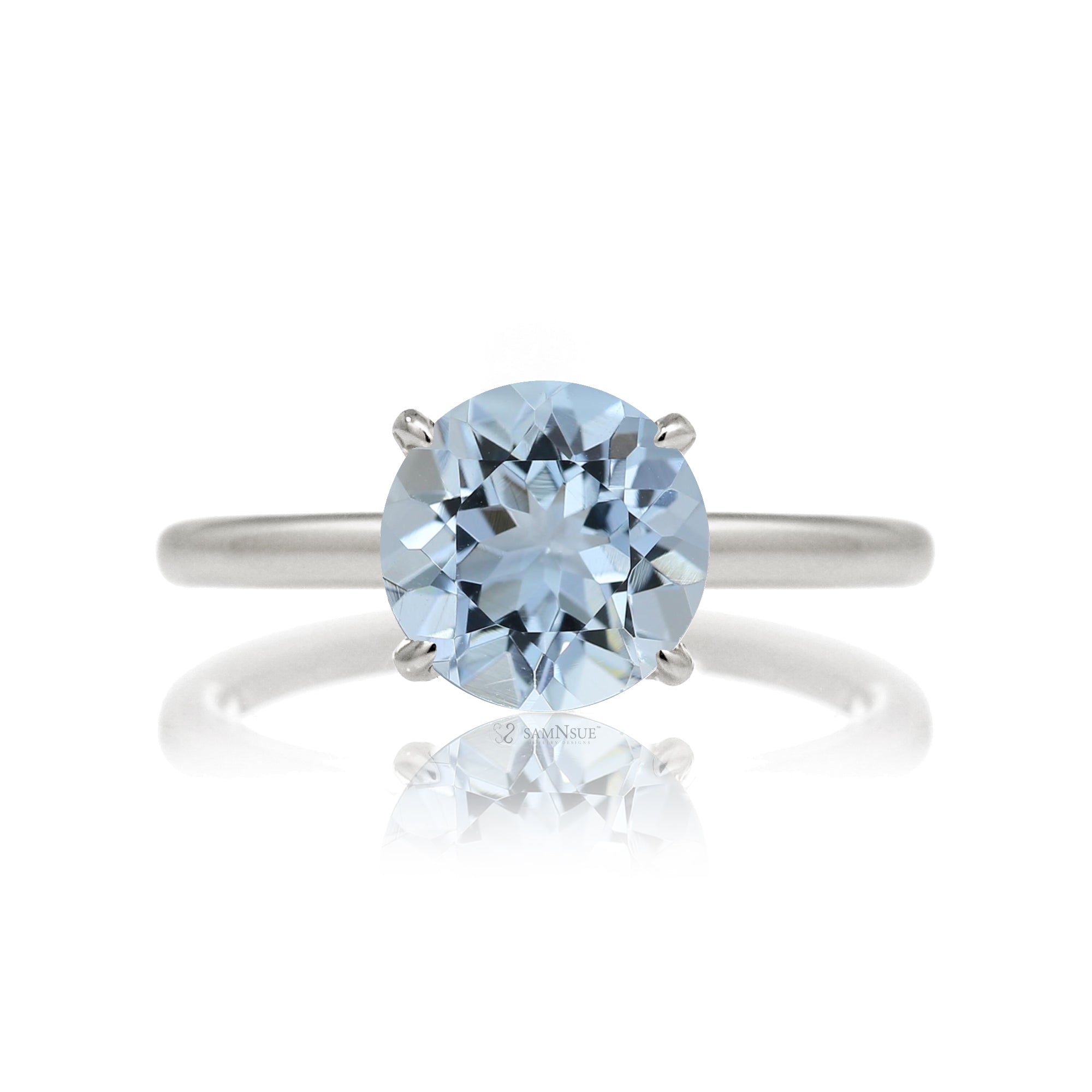 Round aquamarine ring with a diamond hidden halo in white gold