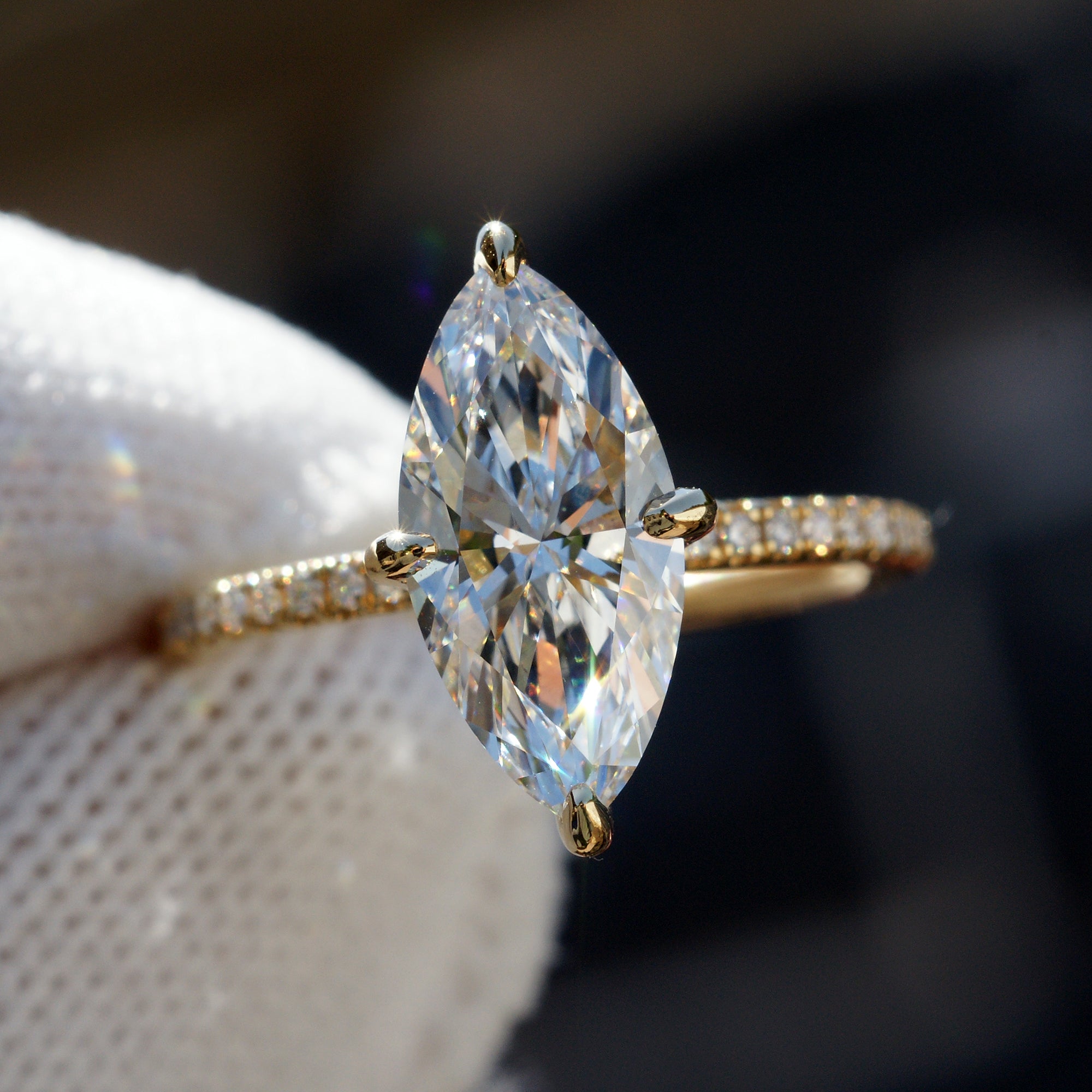 Marquise diamond engagement ring in yellow gold