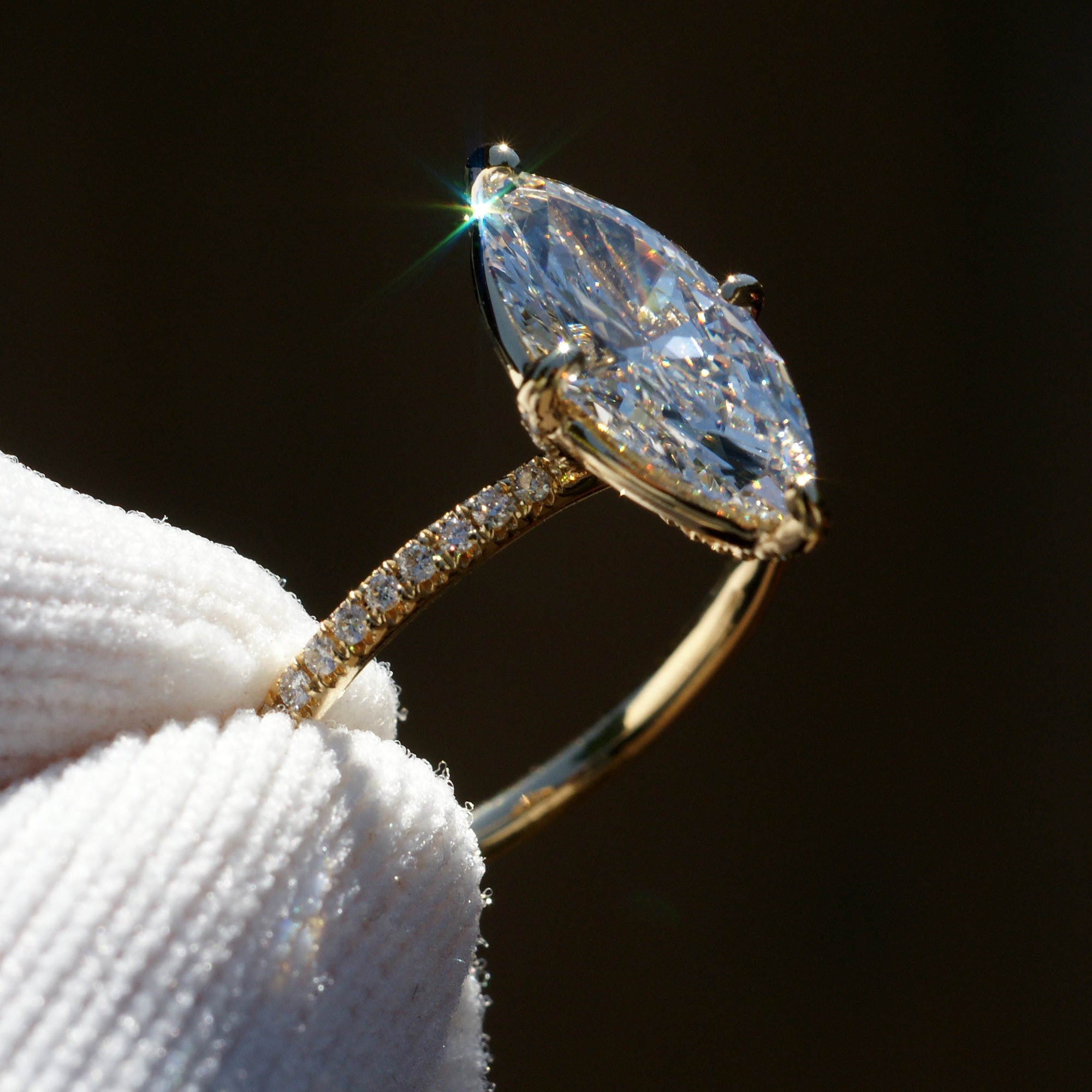 Marquise diamond engagement ring in yellow gold comfort fit band