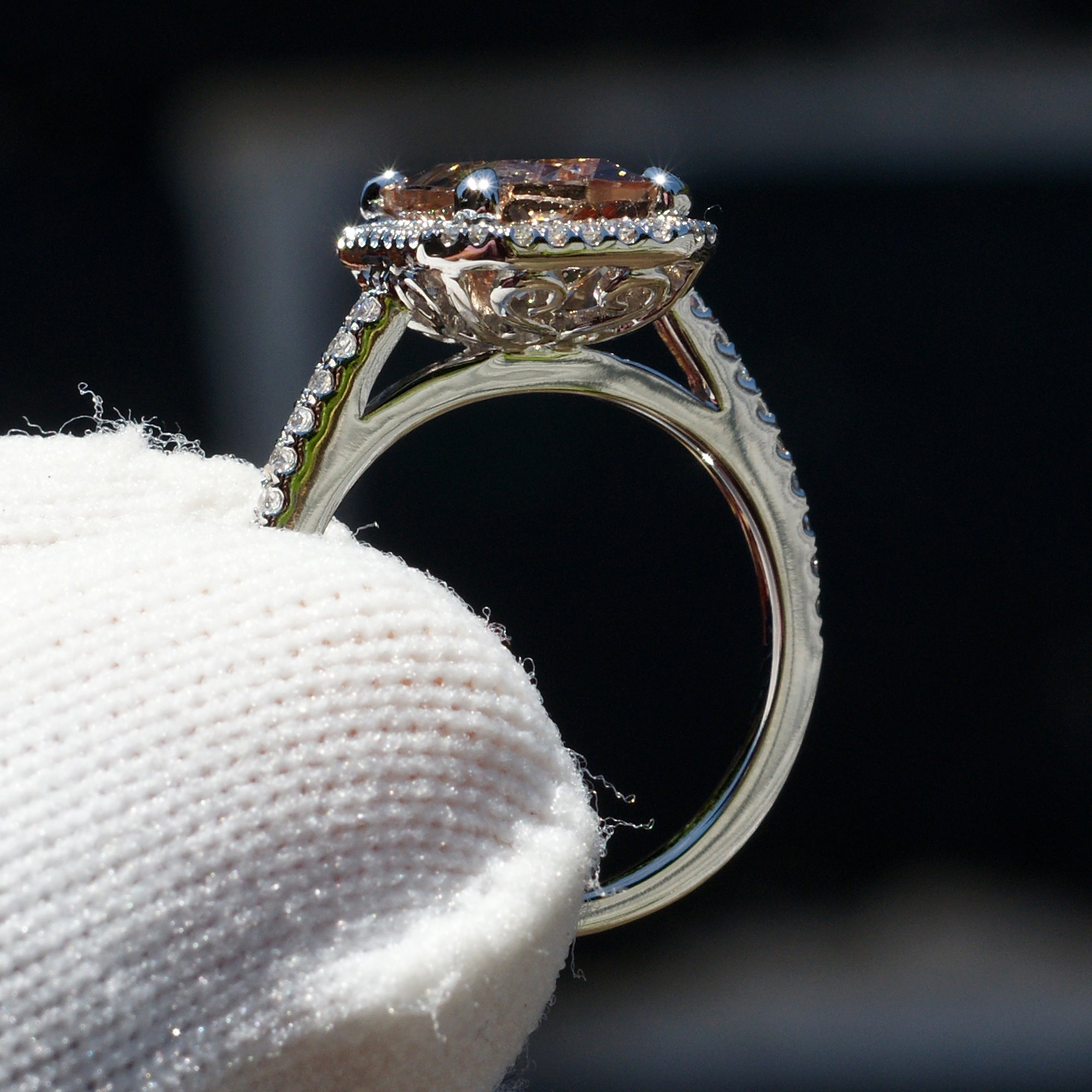 Cushion morganite engagement ring in white gold with diamond halo and band