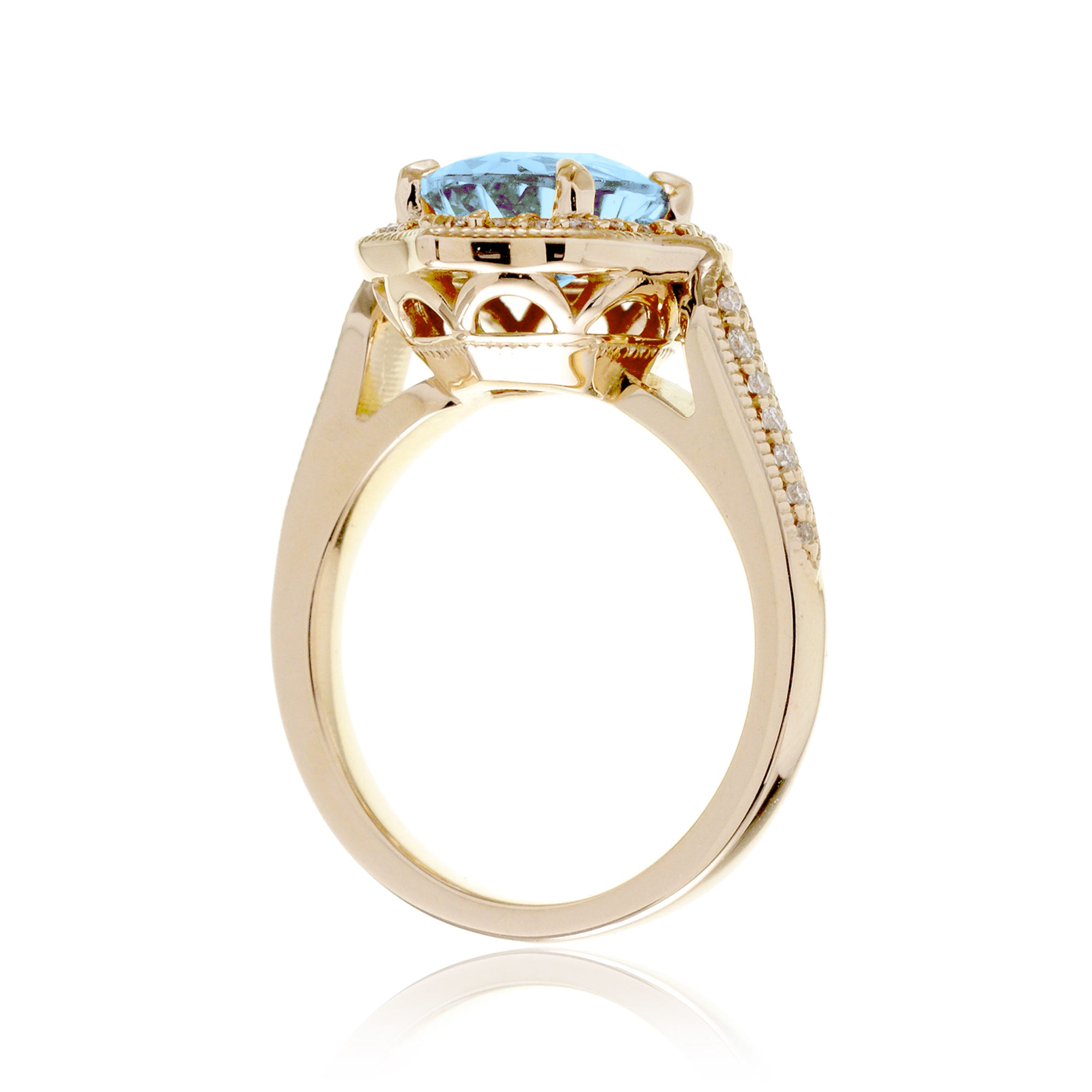 Vintage Oval Aquamarine and Diamond Halo Ring in Yellow Gold