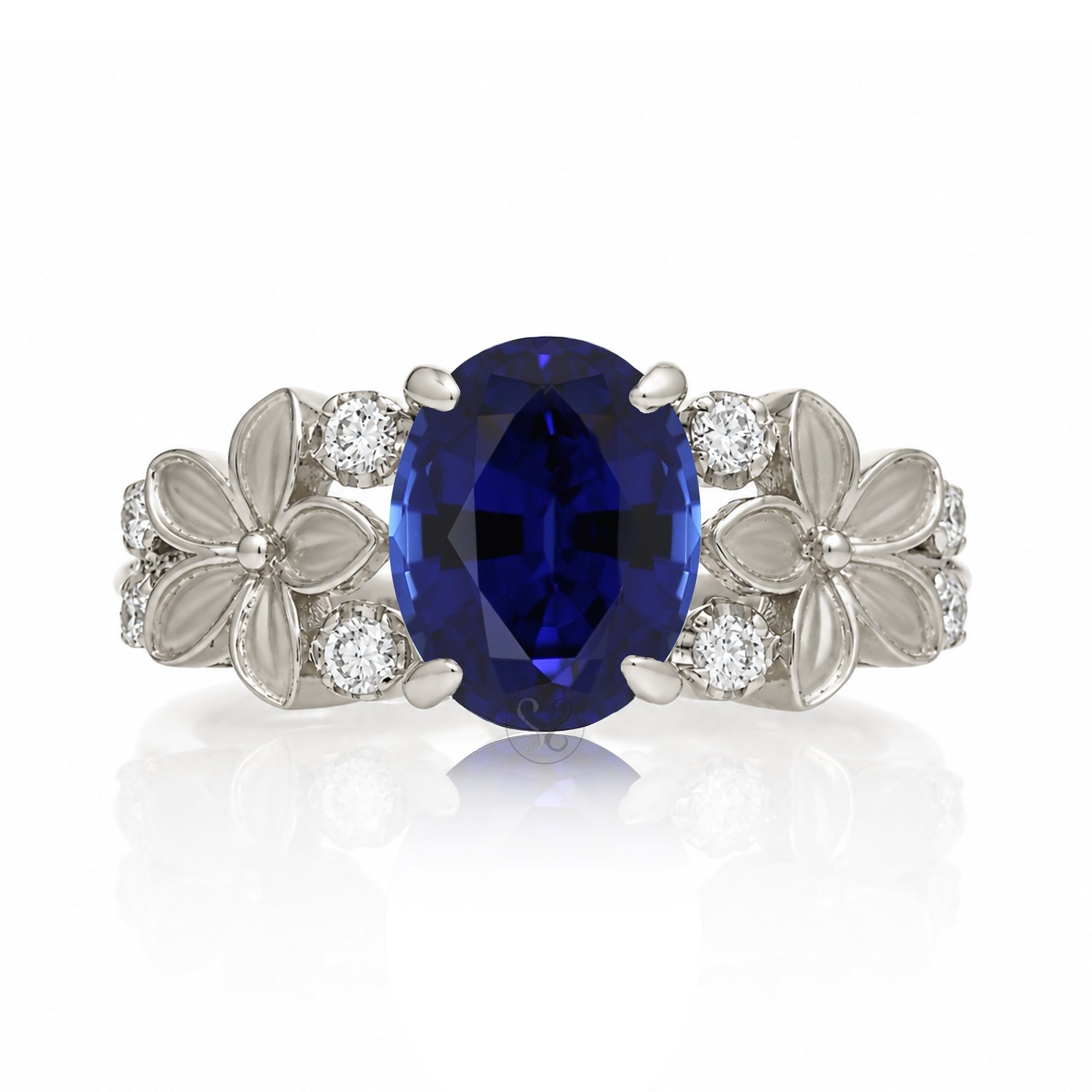 Oval blue sapphire plumeria flower diamond ring in white gold