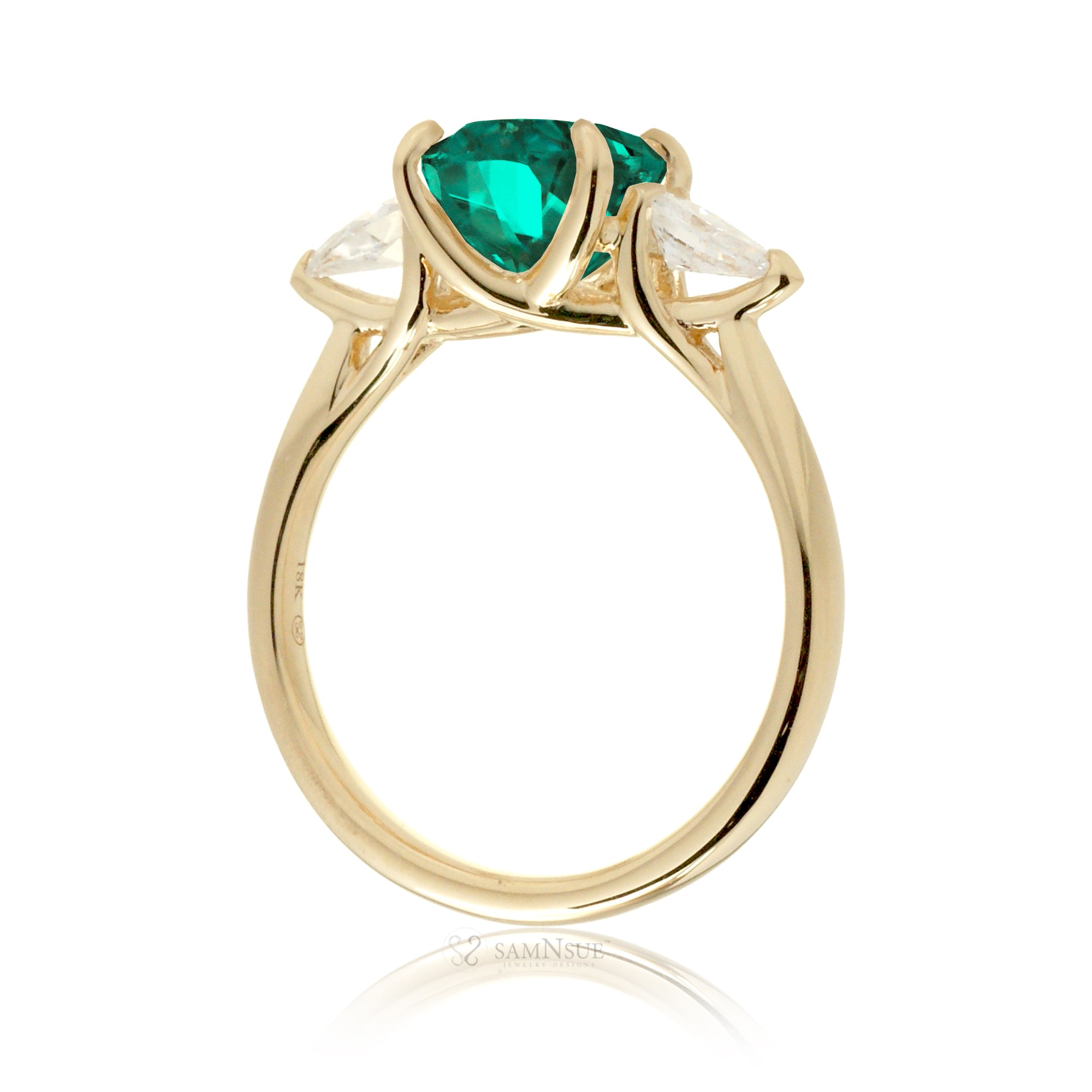 Oval cut green emerald three stone diamond ring yellow gold