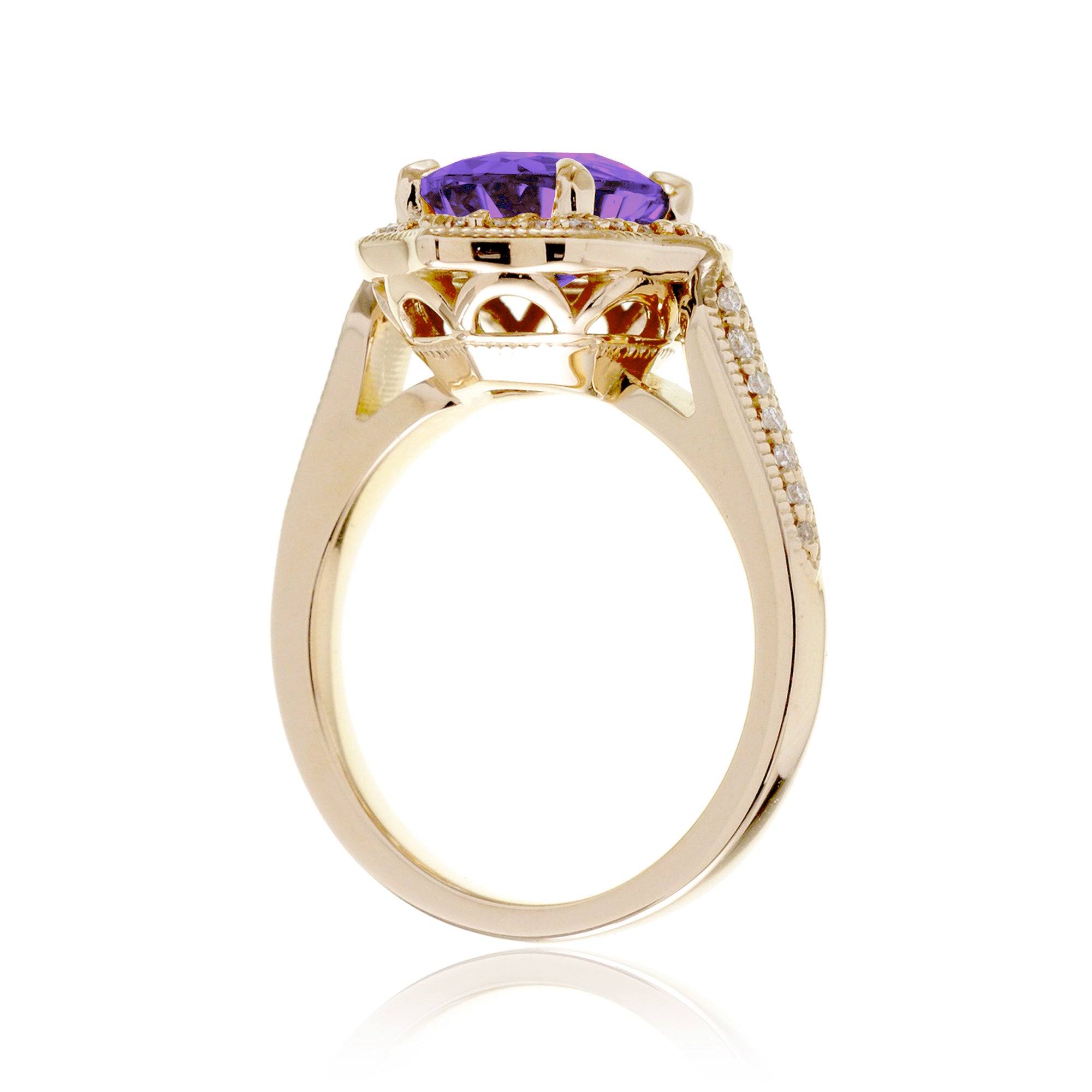 Vintage Oval Amethyst and Diamond Halo Ring in Yellow Gold