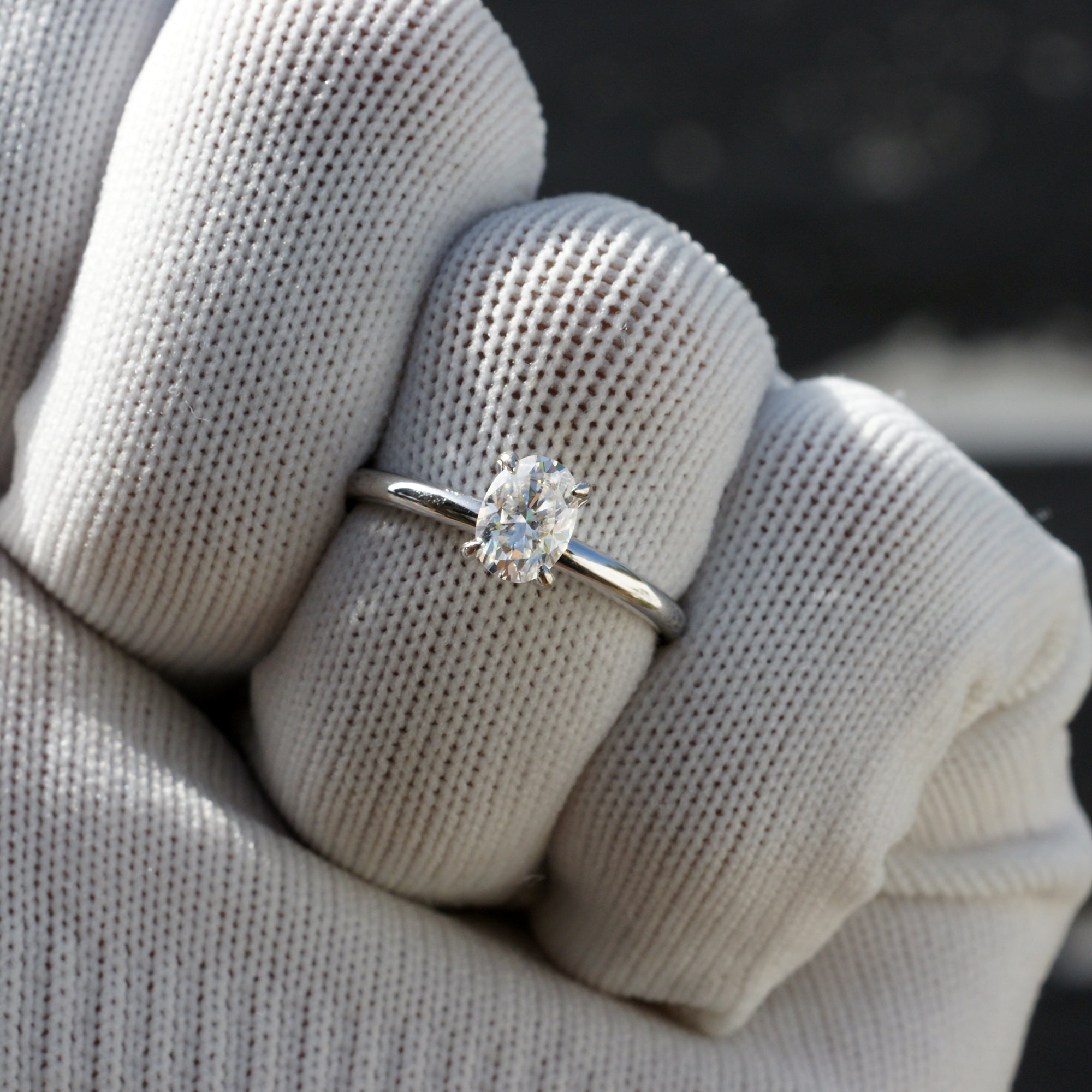 The Lucy Oval Moissanite Ring 7x5mm 18k white gold