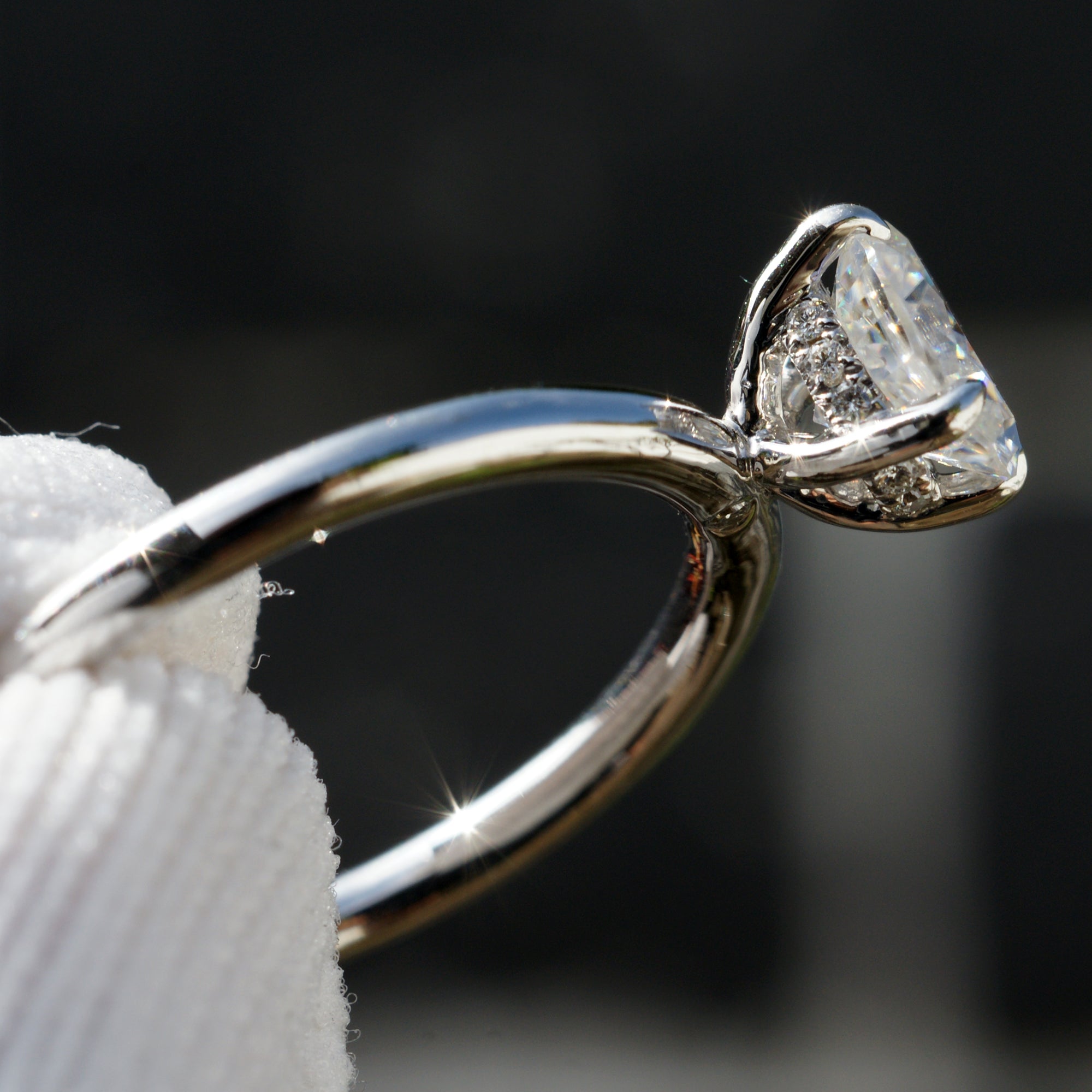 The Lucy Oval Moissanite Ring 7x5mm 18k white gold