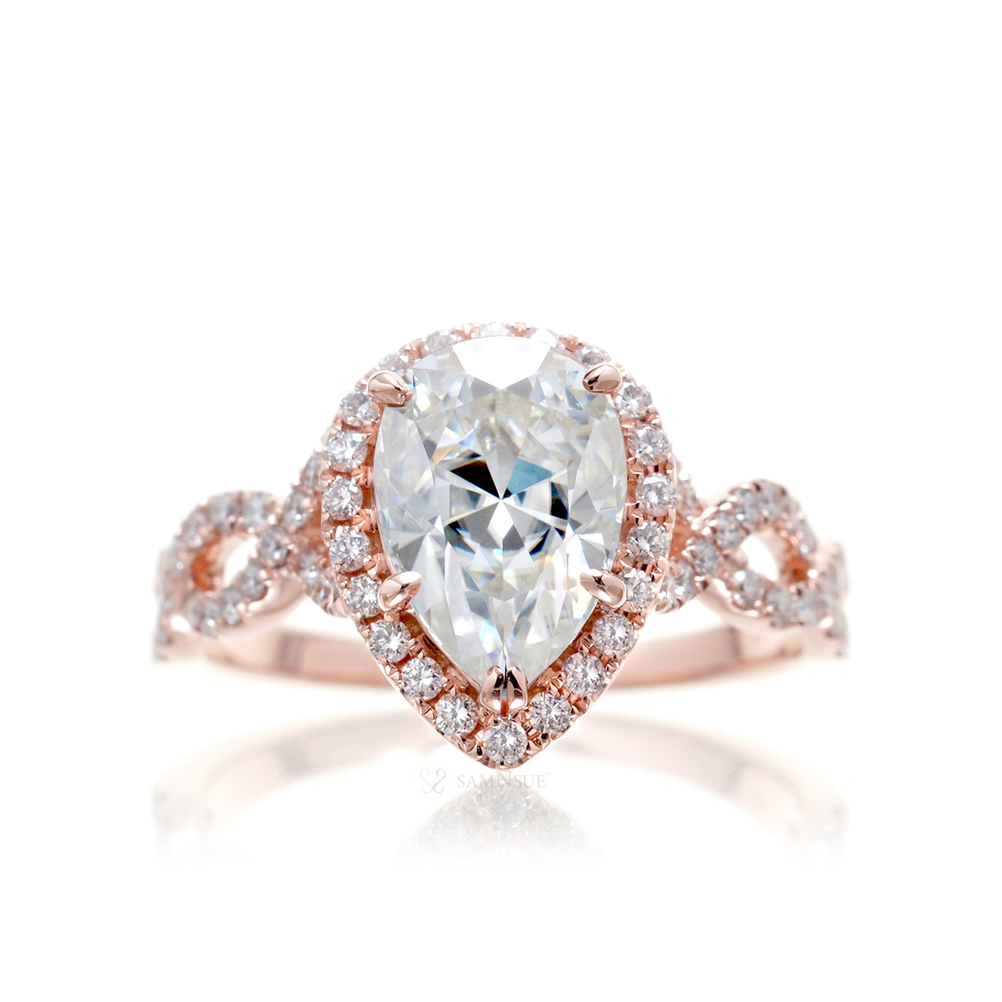 Moissanite pear ring diamond halo and twisted band rose gold