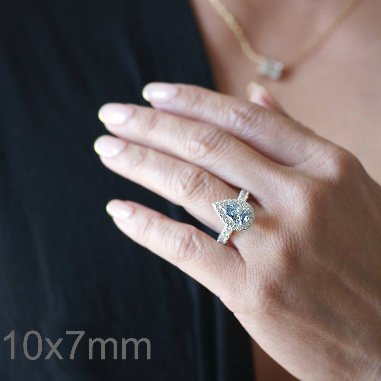 pear aquamarine ring diamond halo in white gold