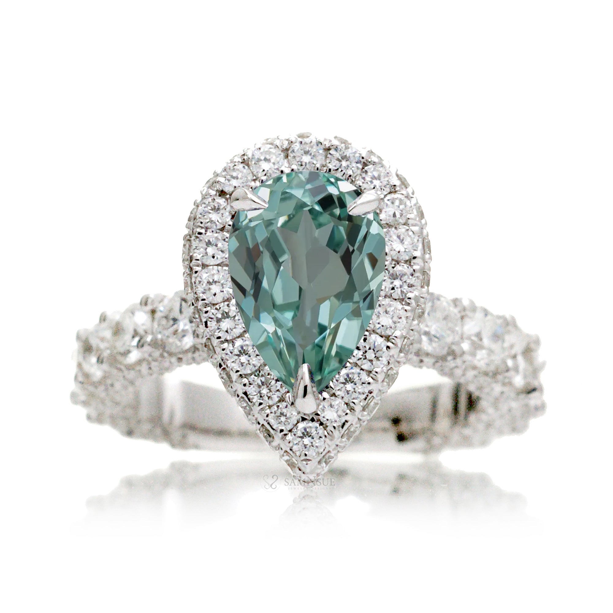 Green sapphire pear cut diamond halo ring